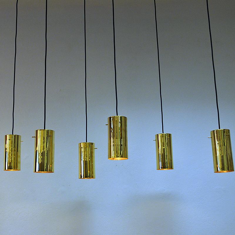 Mid-20th Century Pair of Brass Cylinder Shaped Ceiling Pendants by Hans A. Jakobsson 1960s Sweden