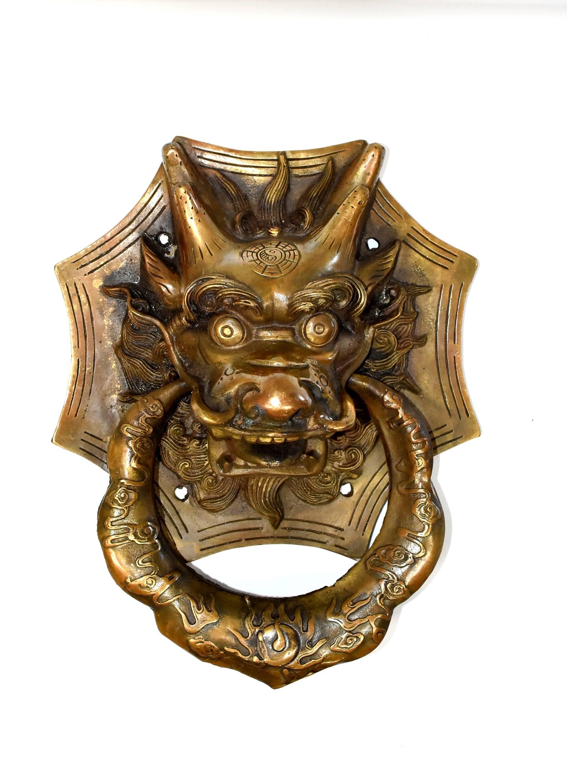 Last Small Pair left in our discontinued inventory. Our brass knockers can be used as door knockers or hand towel rings. Fine craftsmanship depicts the ancient mythical animals with a high level of artistic expression. Dragon is the symbol of