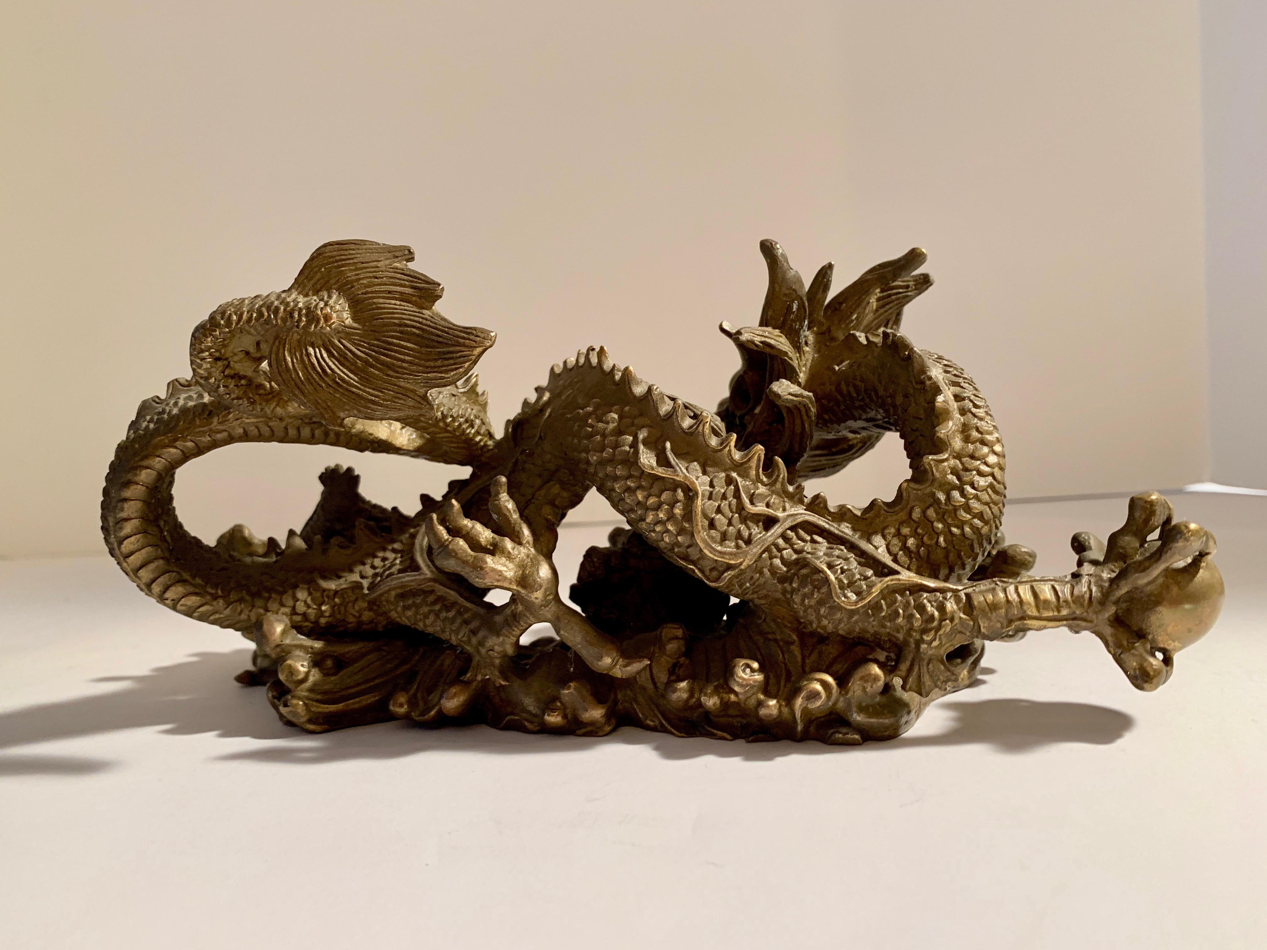 20th Century Pair of Brass Dragons Chasing Ball