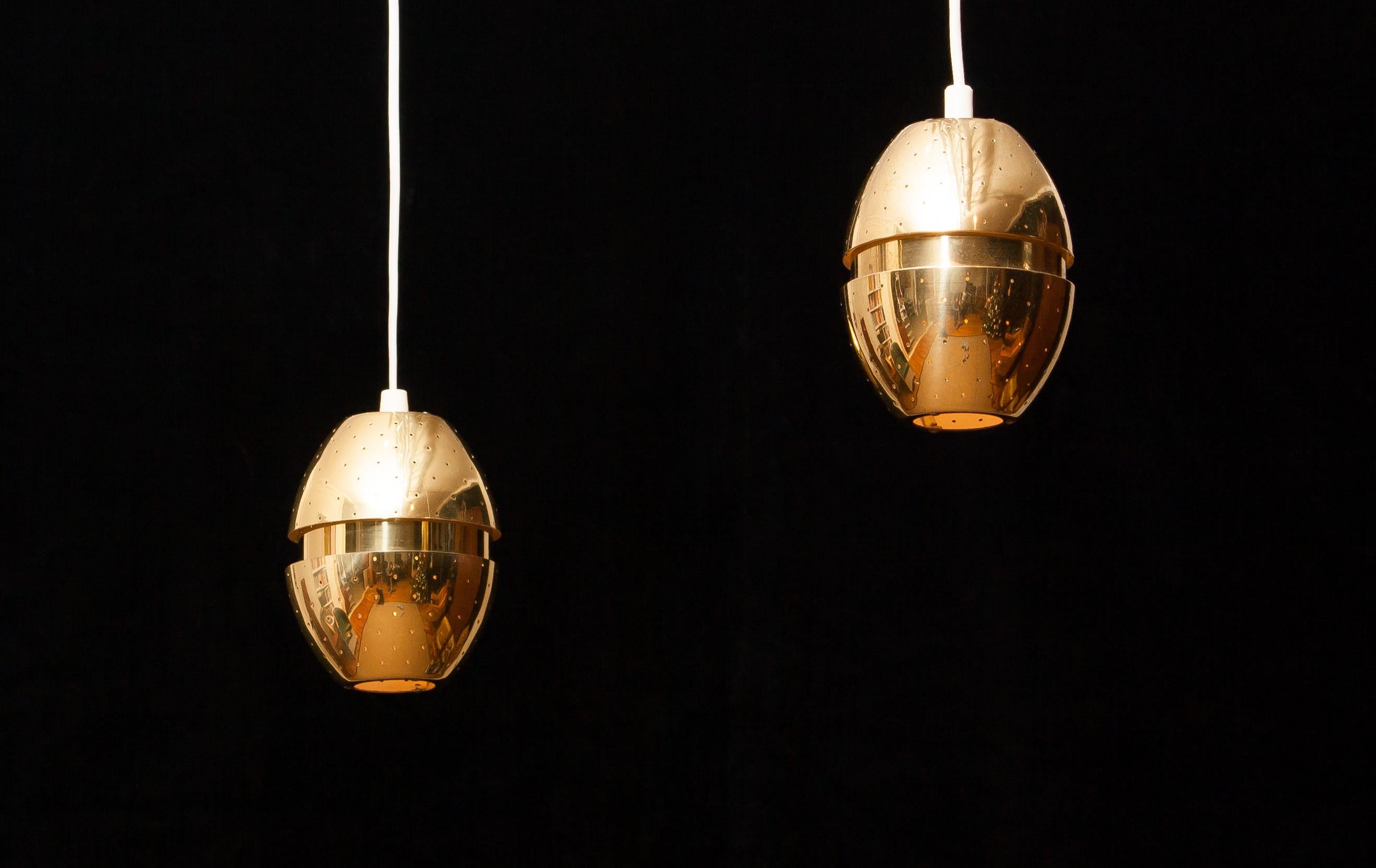 A beautiful pair of pendant lights designed by Hans-Agne Jakobsson, Sweden.
These lamps are made of brass and are perforated with gives a very nice shining.
They are in excellent condition.
Period 1950s
Dimensions: H 14 cm, ø 12 cm.