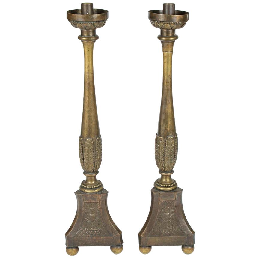 Large Pair of Brass Candelabras with Lions Holding the Coat of Arms of