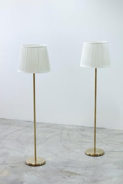 Pair of brass floor Lamps by ASEA belysning, Sweden, 1950s