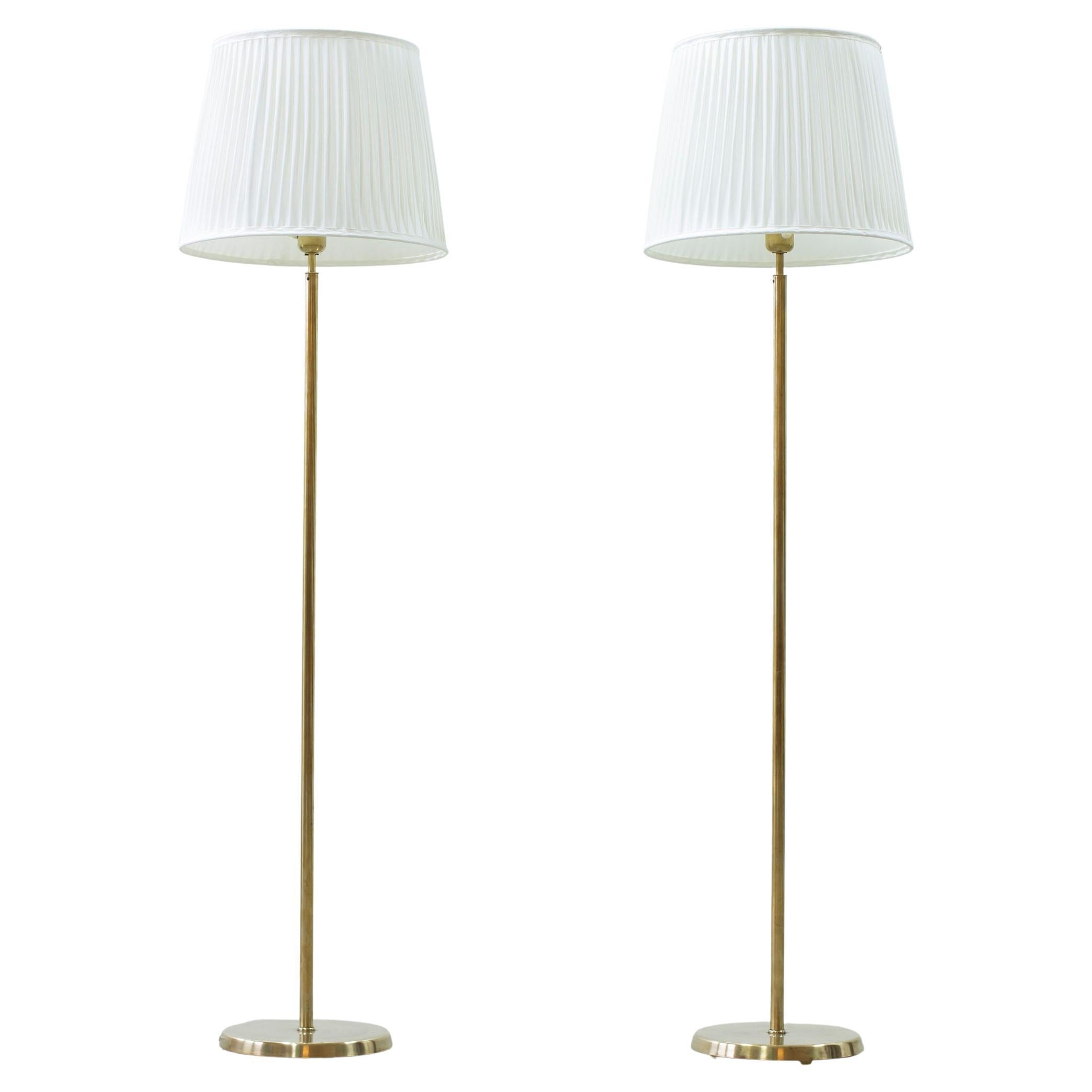 Pair of brass floor Lamps by ASEA belysning, Sweden, 1950s