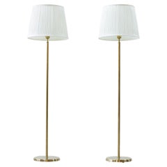 Pair of brass floor Lamps by ASEA belysning, Sweden, 1950s