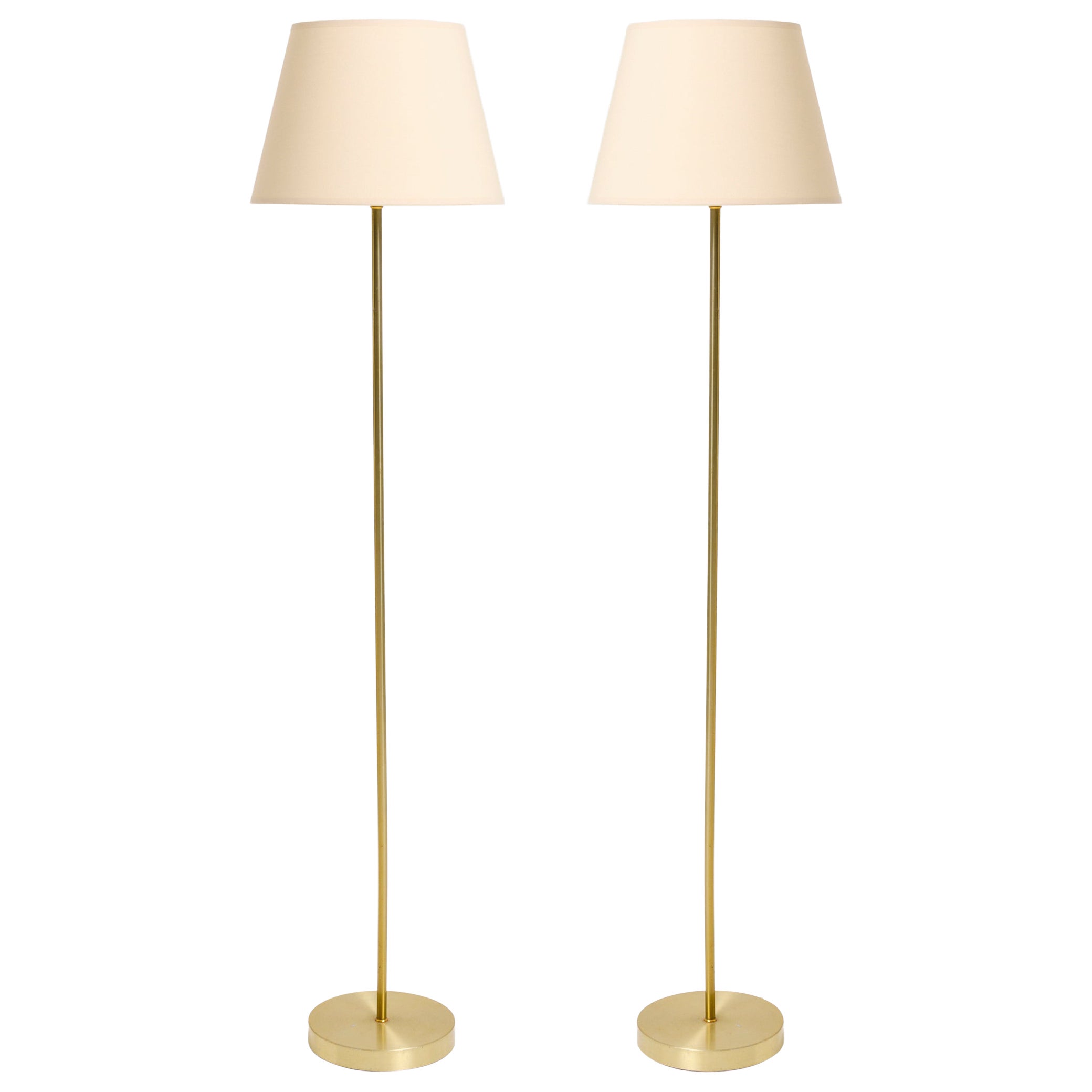 Coppia di lampade da terra in ottone