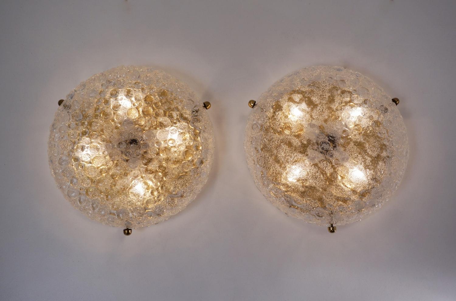 Pair of brass flush lights with glass shade by Hillebrand Lighting, circa 1970s, German.
Both lights have been thoroughly cleaned respecting the vintage patina. Newly rewired, earthed, in full working order and ready to install. Light bulbs