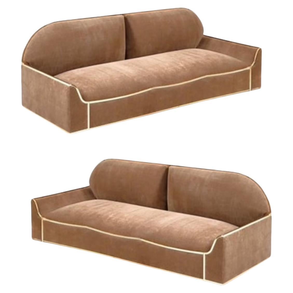 Coppia di divani con struttura in ottone, 1960