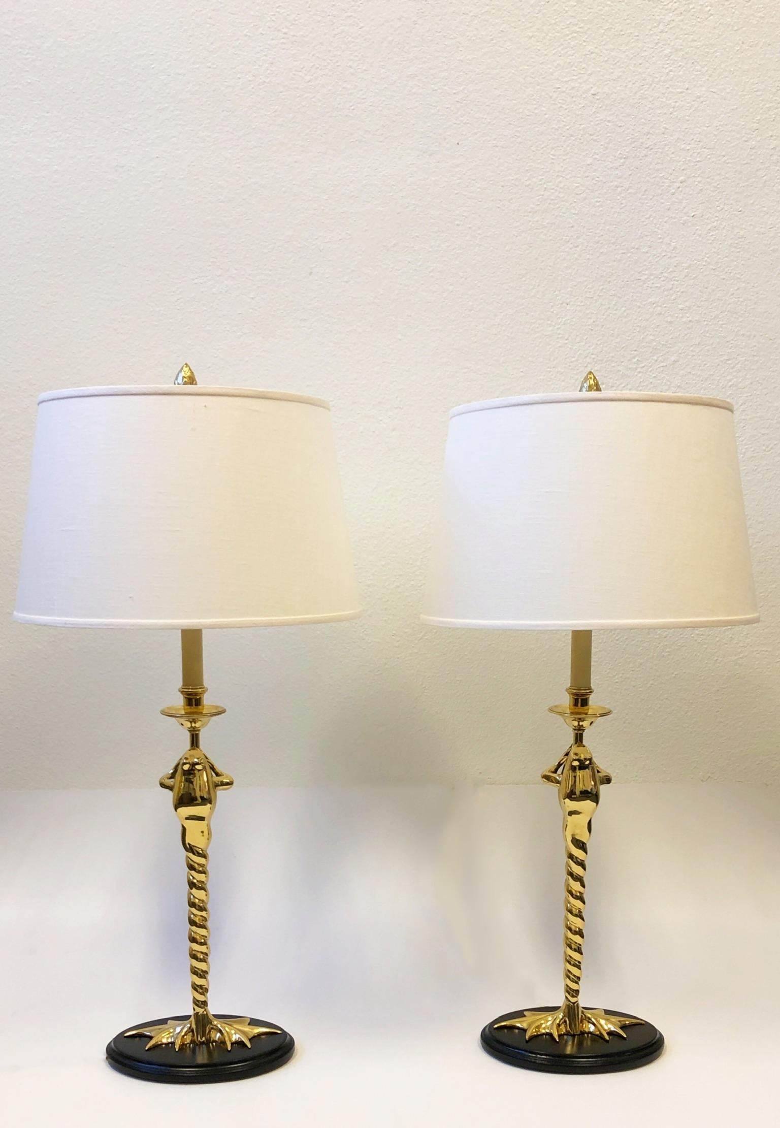 A glamorous 1970s pair of polished brass and black lacquered frog table lamps by Chapman lighting. The lamps have been newly rewired and new vanilla linen shades.
Measurements: 16.5” diameter, 32.25” high to top of shade.
Base is 9.5” wide, 6.75”