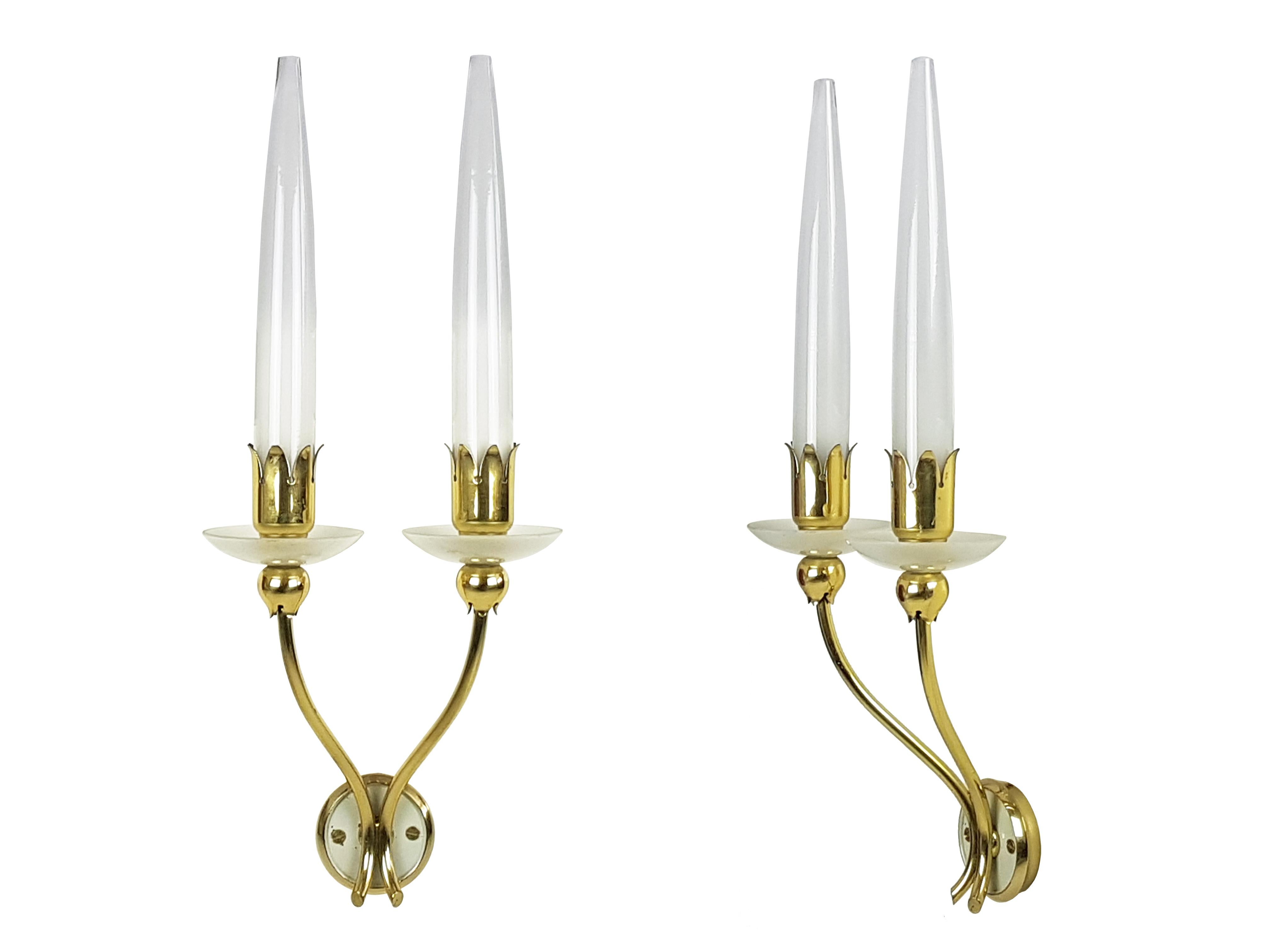 Pair of wall fixtures made from a brass structure with sandblasted and translucent saucher and shades. Very good condition.