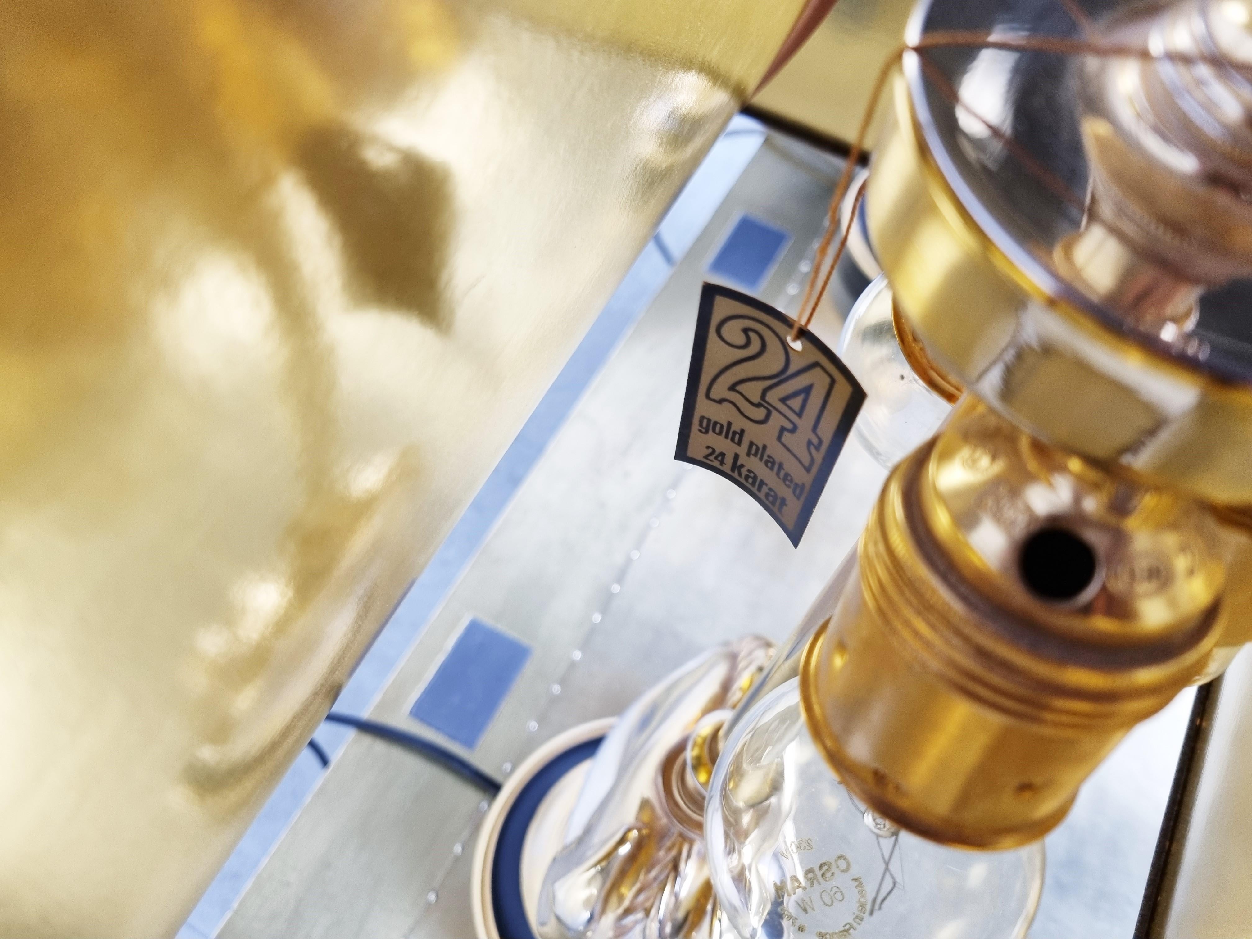 Ein Paar Vintage-Pferdekopf-Tischlampen von Deknudt.

Hollywood-Regency-Stil.

Hergestellt aus 24kt vergoldetem Metall.

Zur Verwendung mit einer E14- und zwei E27-Lampen;

Die Lampe hat verschiedene Einstellungen, so dass Sie wählen können,