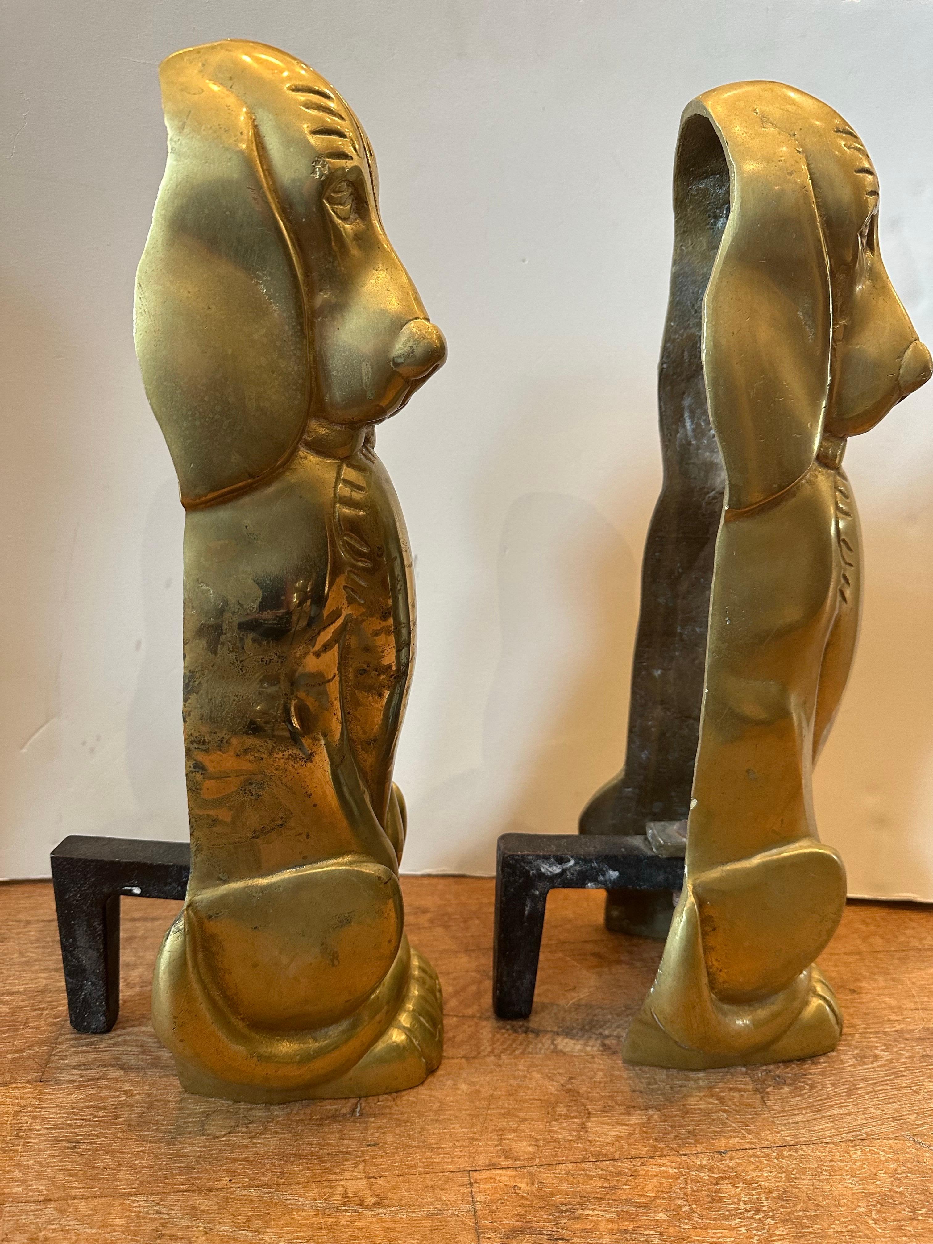 Whimsical pair of hound dog brass andirons for the dog lover.... signed D. Gessford.....