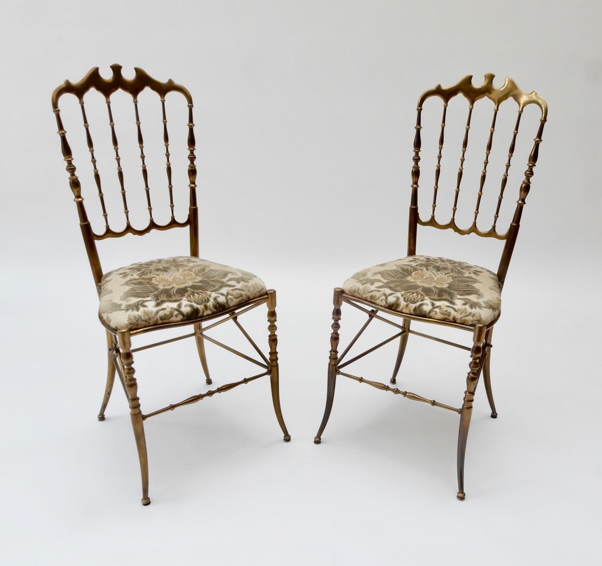 Pair of brass Italian chairs by Chiavari with the original fabric.