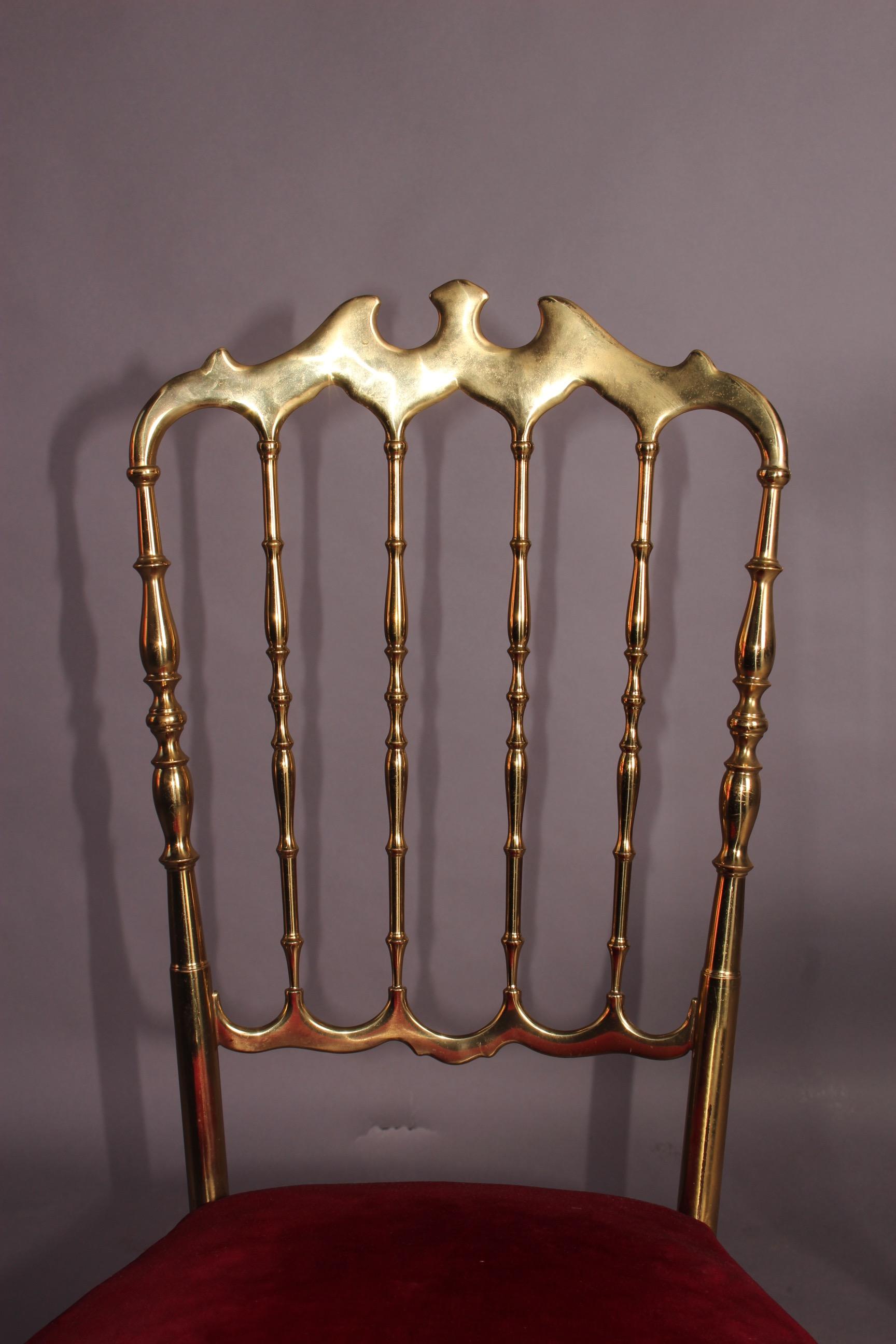 Pair of brass Italian Chiavari chairs.