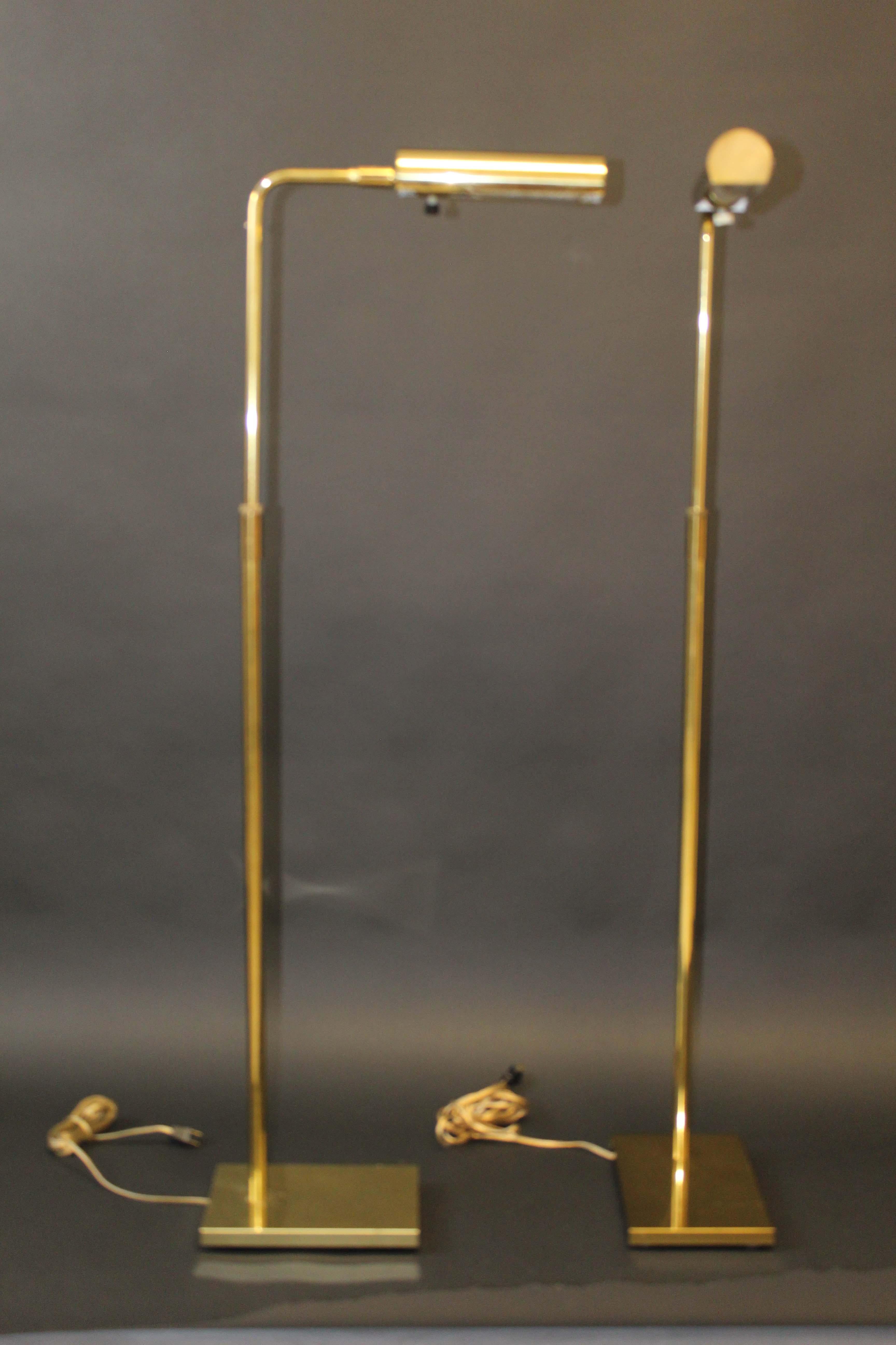 Up for consideration is a pair of Mid-Century Modern brass floor lamps. This pair is stamped by the manufacturer, Koch & Lowy and in very good condition with minor imperfections and adjustable in height as well as the shade angle.