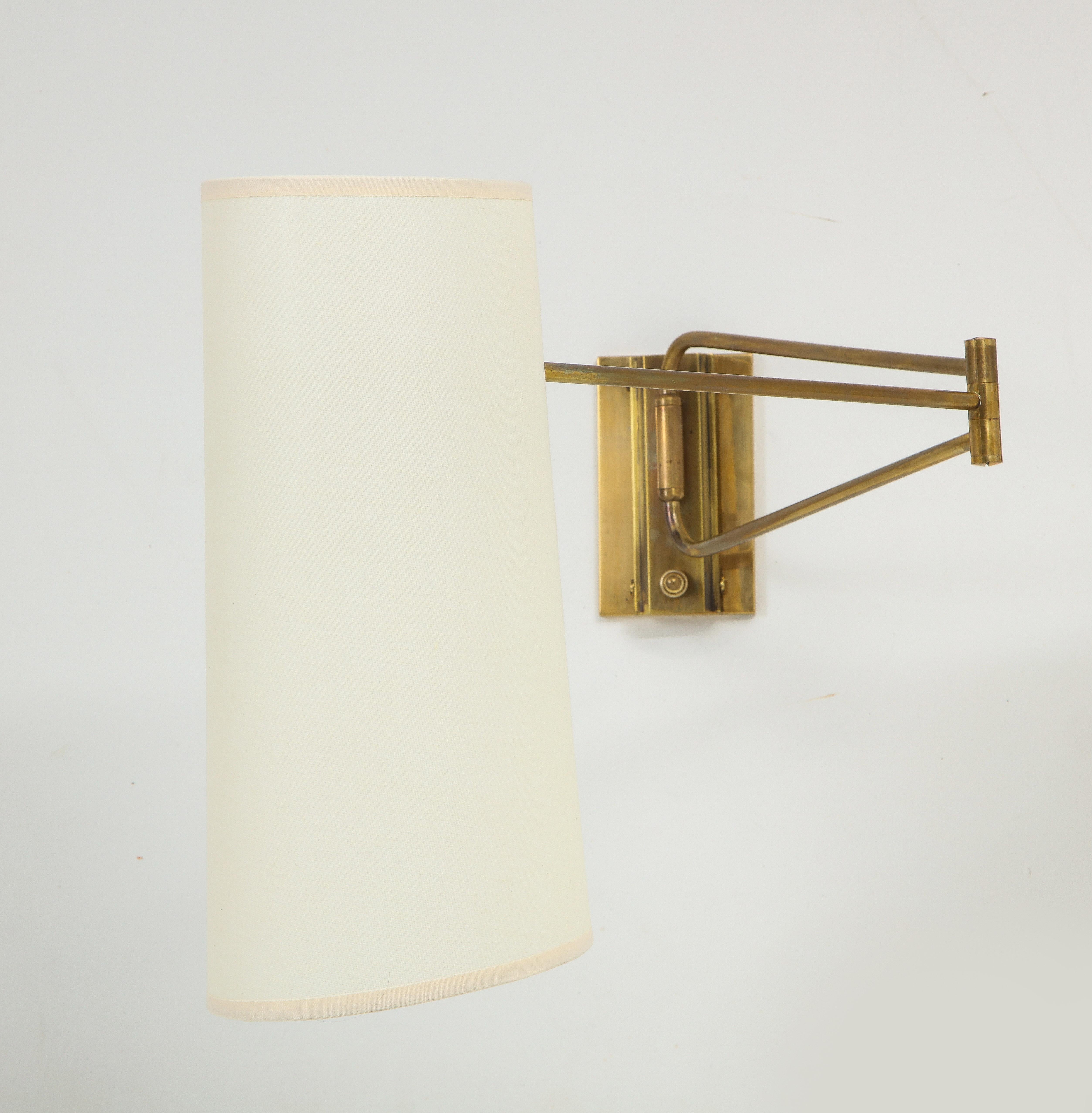 Pair of Brass Lunel Swingarm Sconces with Paper Shades, France 1960's In Good Condition For Sale In New York, NY