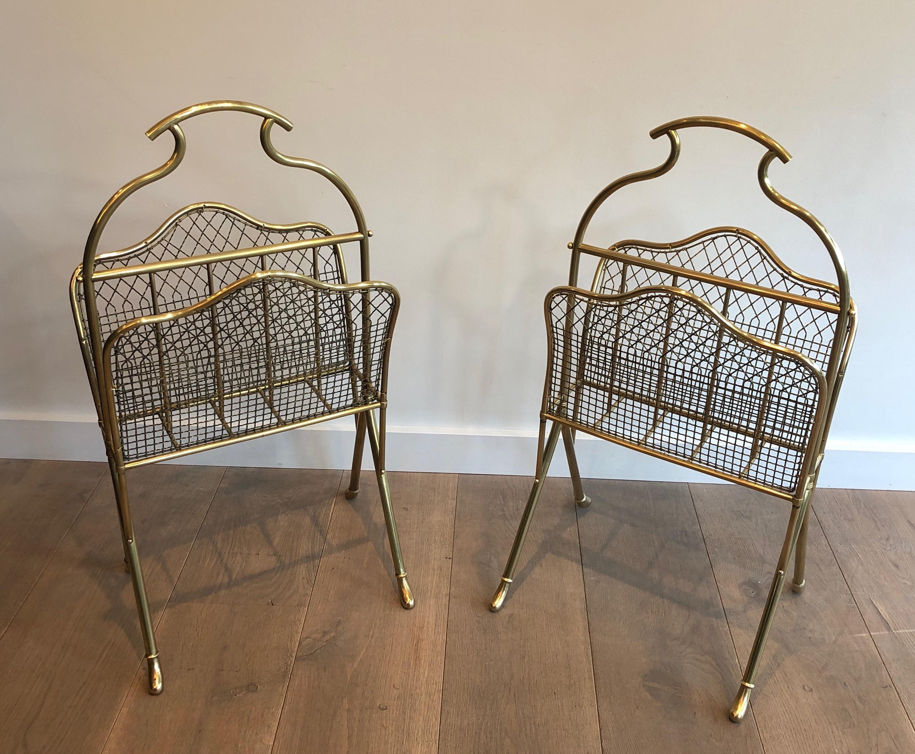 This rare pair of neoclassical style magazine racks is made of brass. This is a work attributed to famous French designer Maison Jansen. circa 1900.