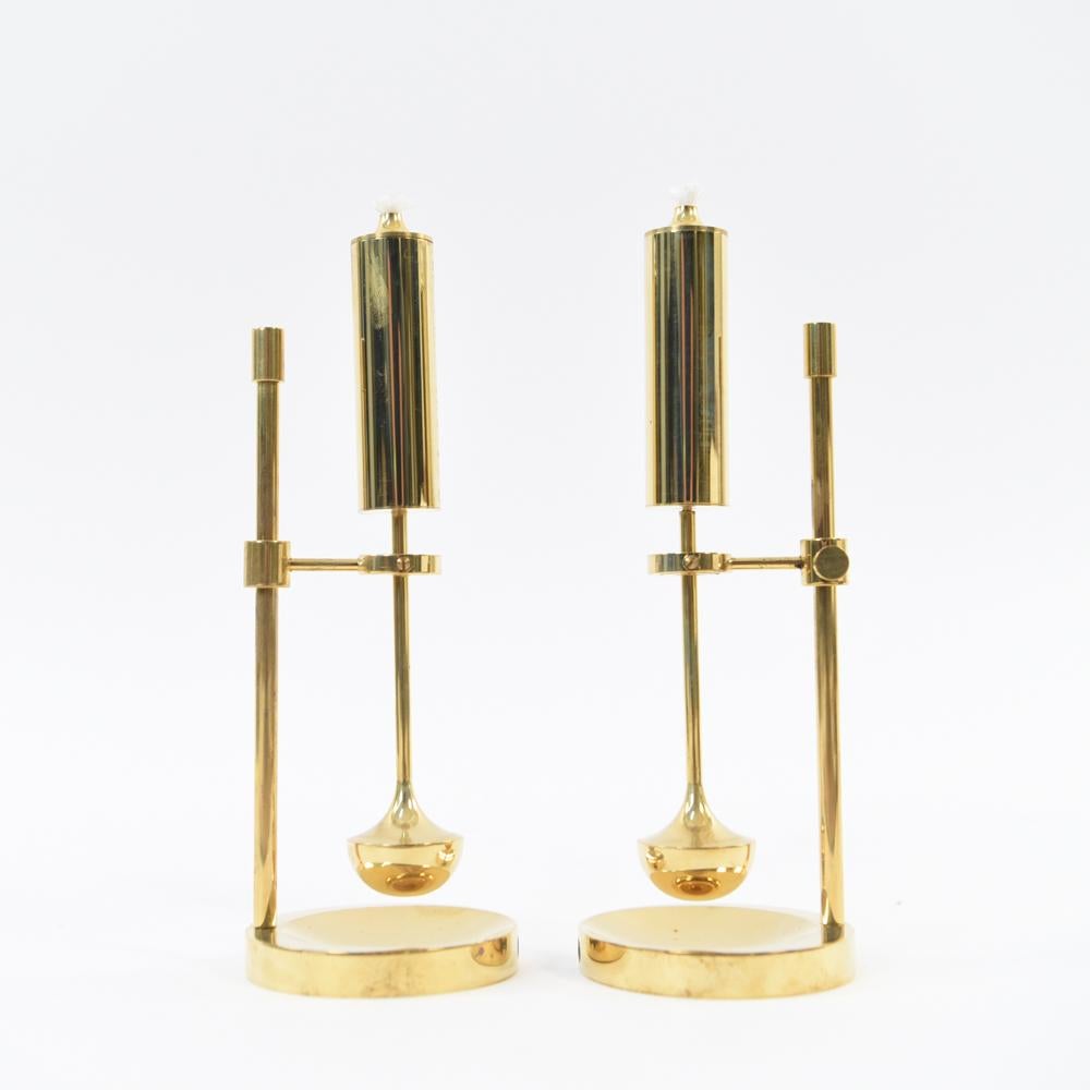 A pair of midcentury Danish gyro brass oil lamps in original boxes, called 