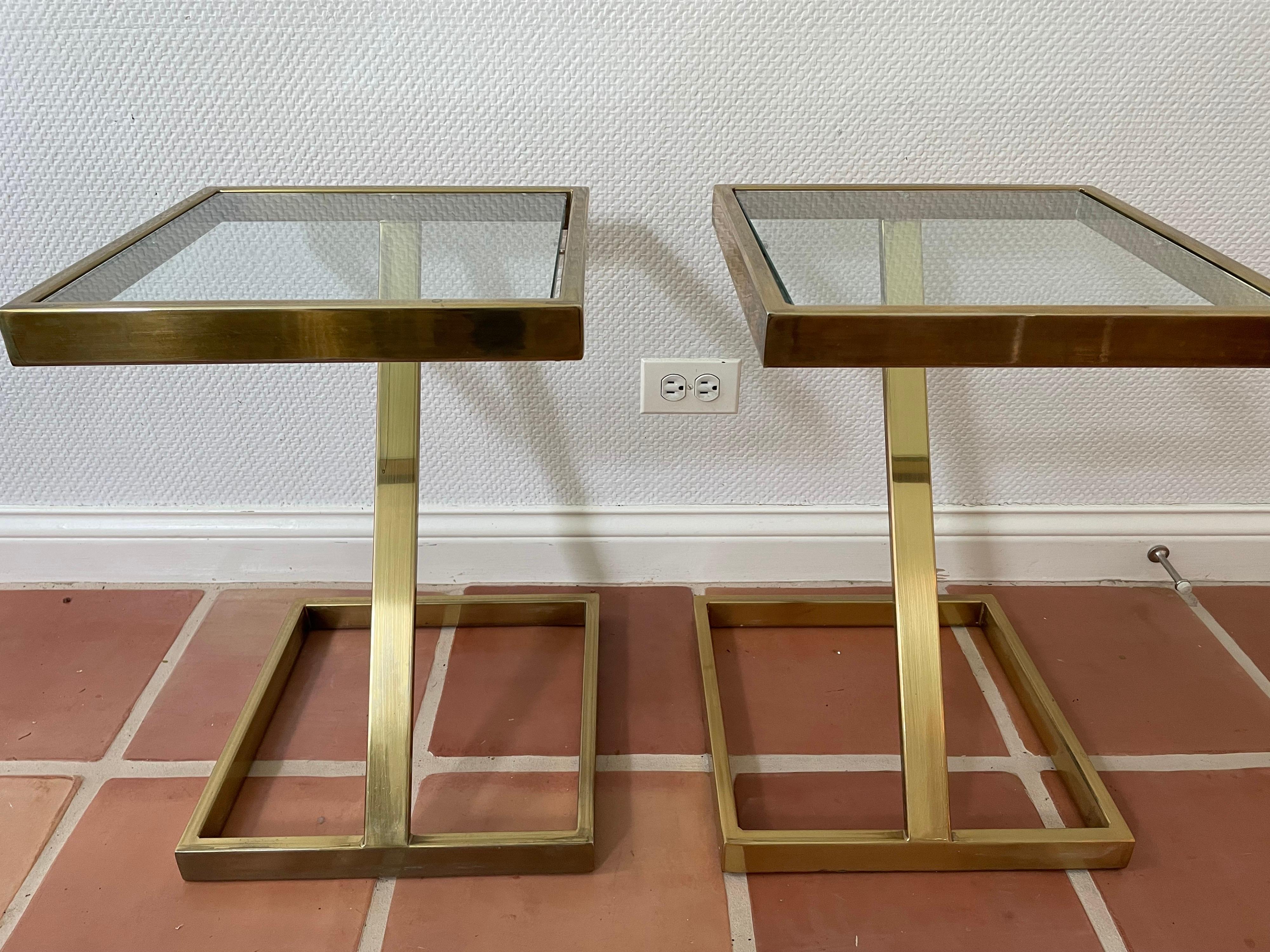 This is a great pair of brass and glass (3/8 inch) side Z tables by Milo Baughman probably from 1970s in great condition.