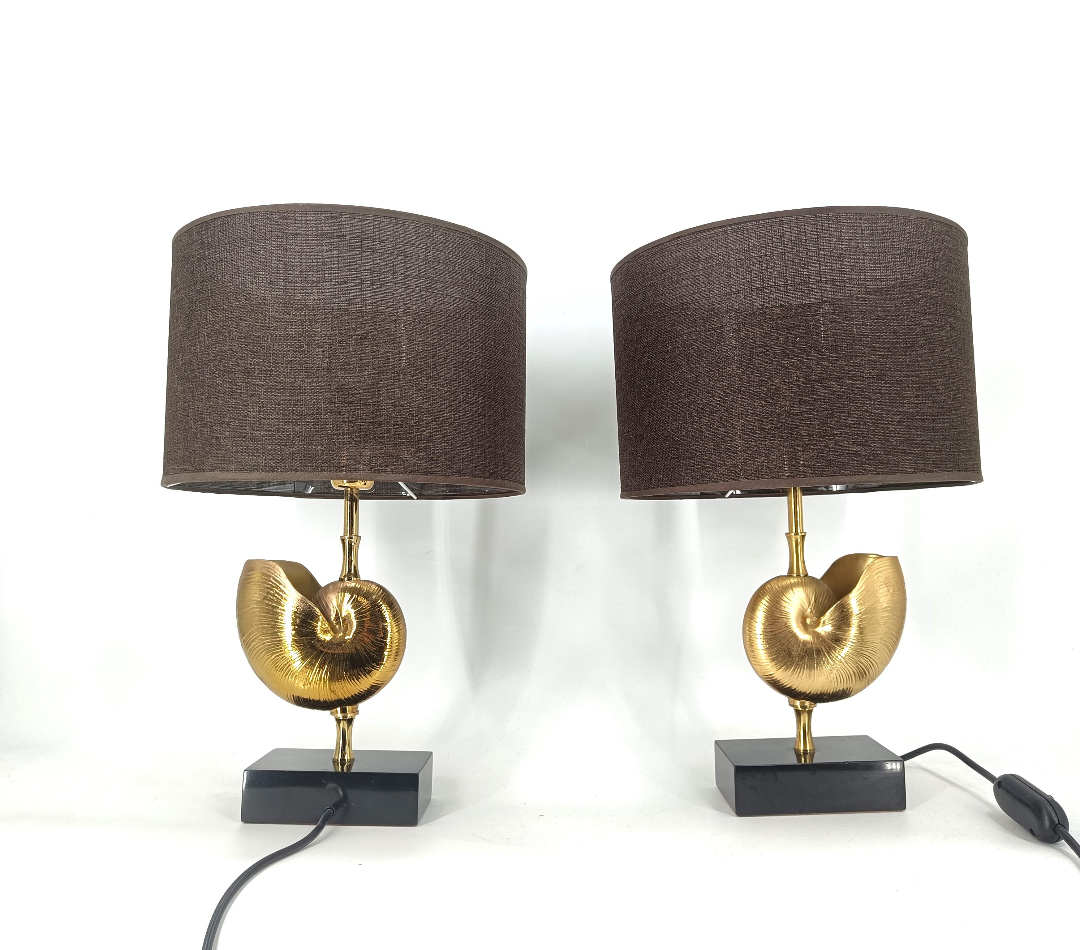 Pair of brass nautilus table lamps, 1970s - France