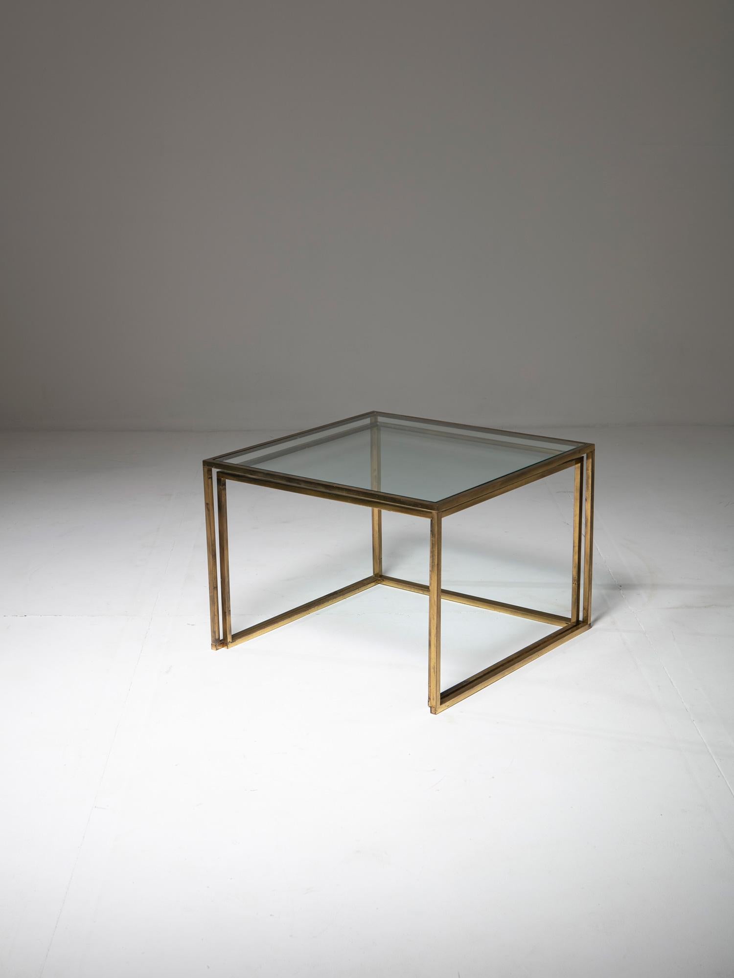 Italian 1970s nesting tables with brass frame and glass top.