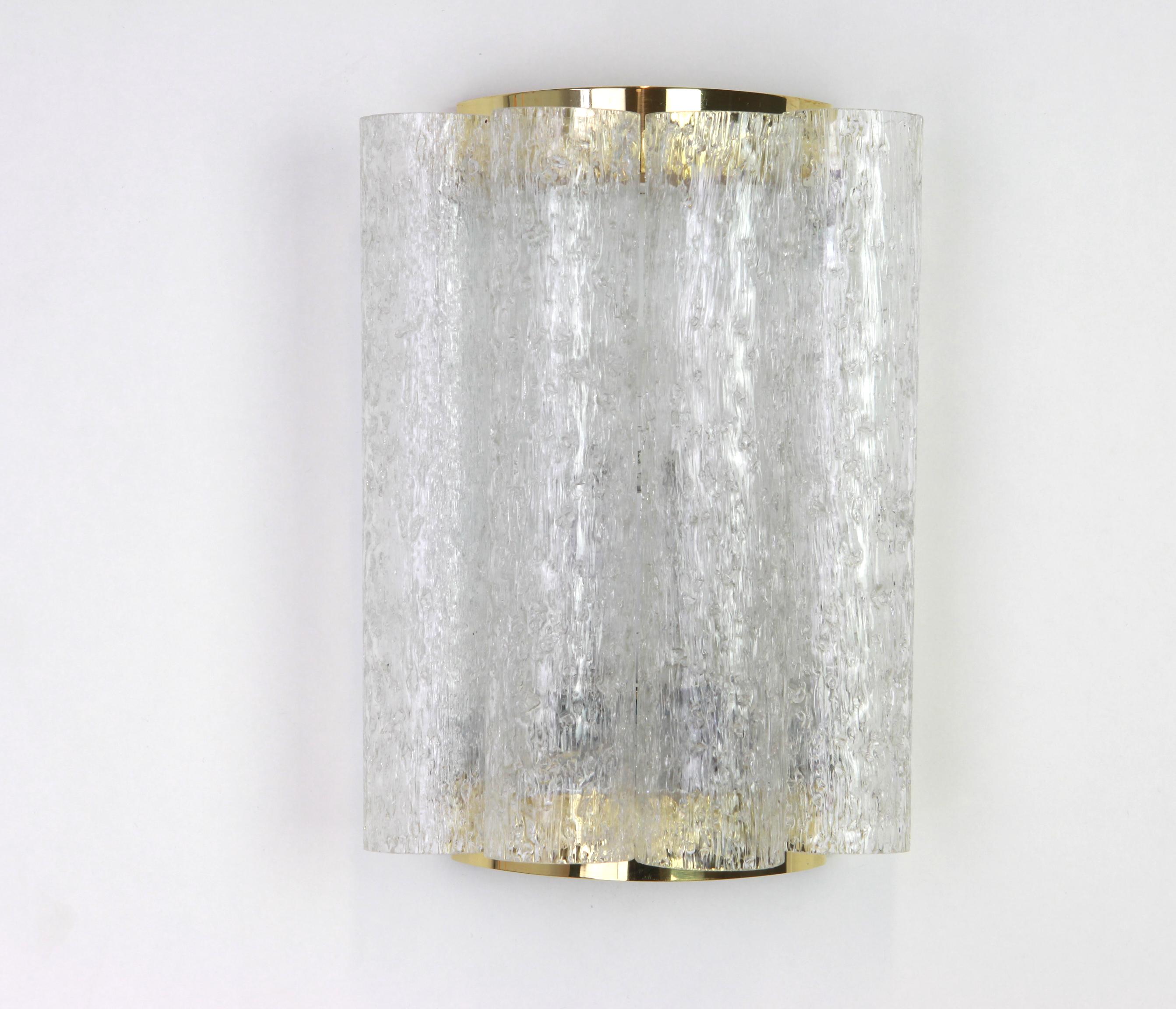Wonderful pair of midcentury wall sconces with ice glass tubes, made by Doria Leuchten, Germany , manufactured, circa 1960-1969.
High quality and in very good condition. Cleaned, well-wired and ready to use.

Each sconce requires 1 x E14 Standard