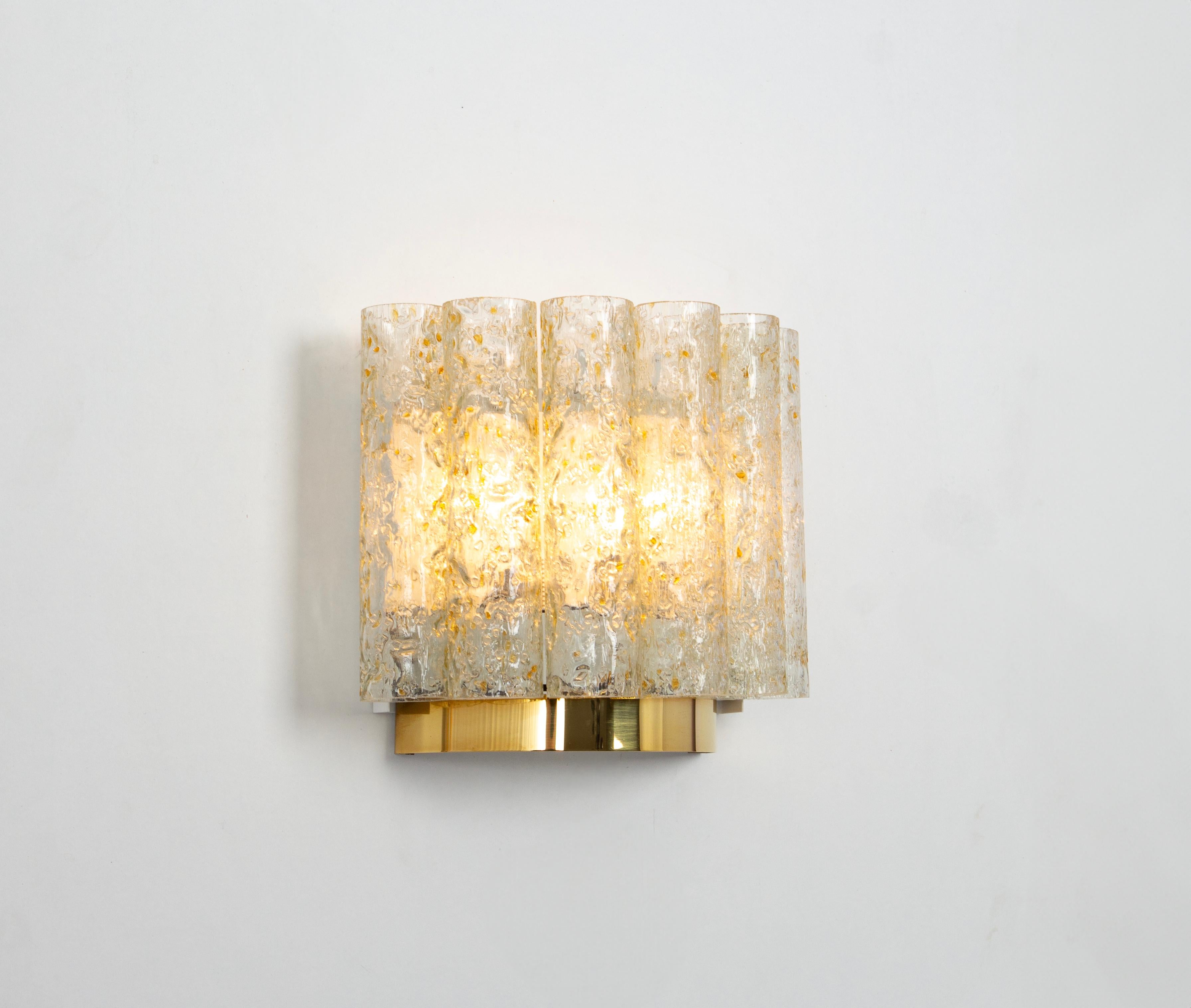 Wonderful pair of midcentury wall sconces with ice glass tubes, made by Doria Leuchten, Germany, manufactured, circa 1960-1969.

High quality and in very good condition. Cleaned, well-wired and ready to use. 

Each sconce requires 2 x E14 Standard