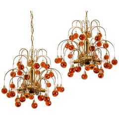 Pair of Brass Orange and Red Four Tiers Murano Chandeliers, 1970s