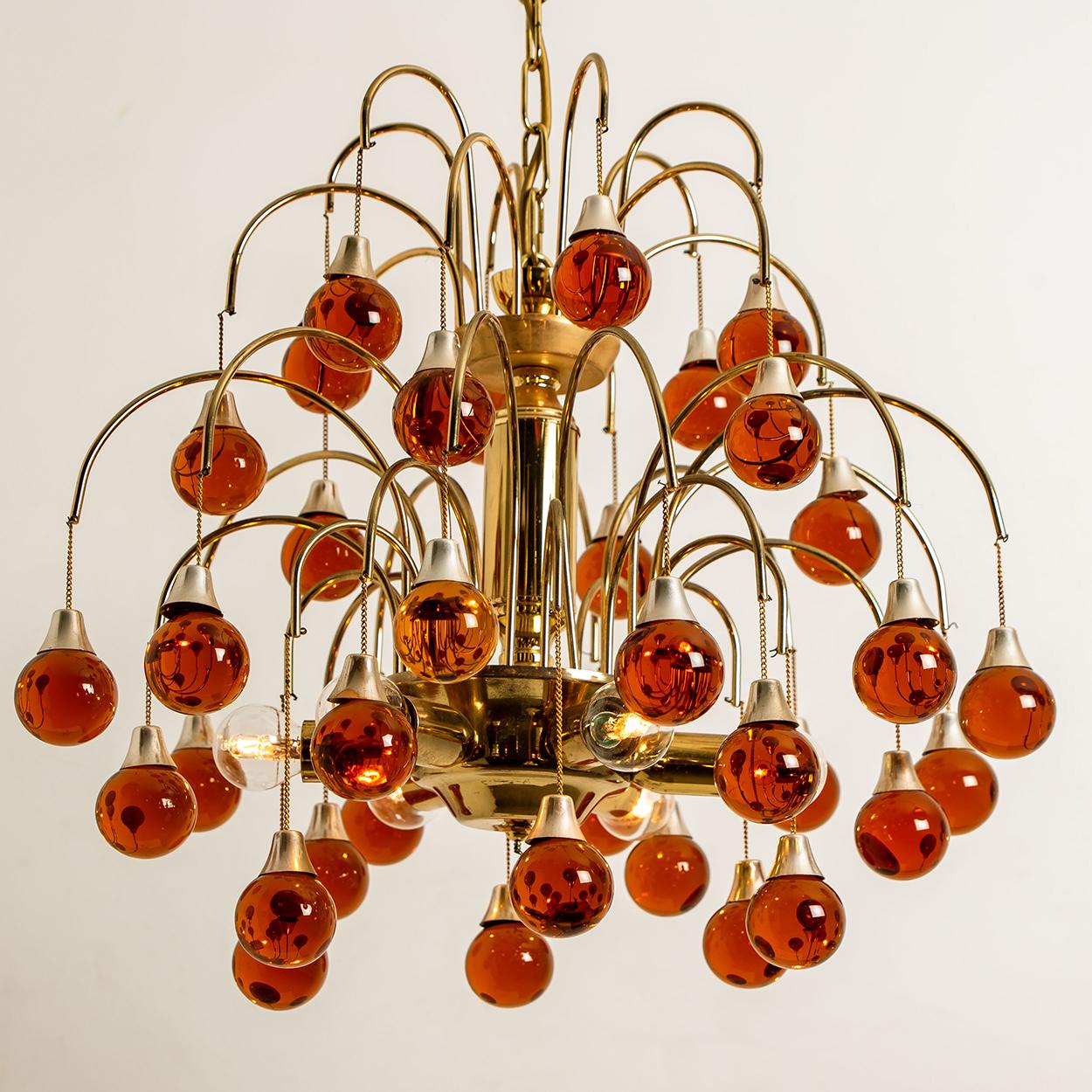 Mid-Century Modern Pair of Brass Orange and Red Four Tiers Murano Chandeliers, 1970s