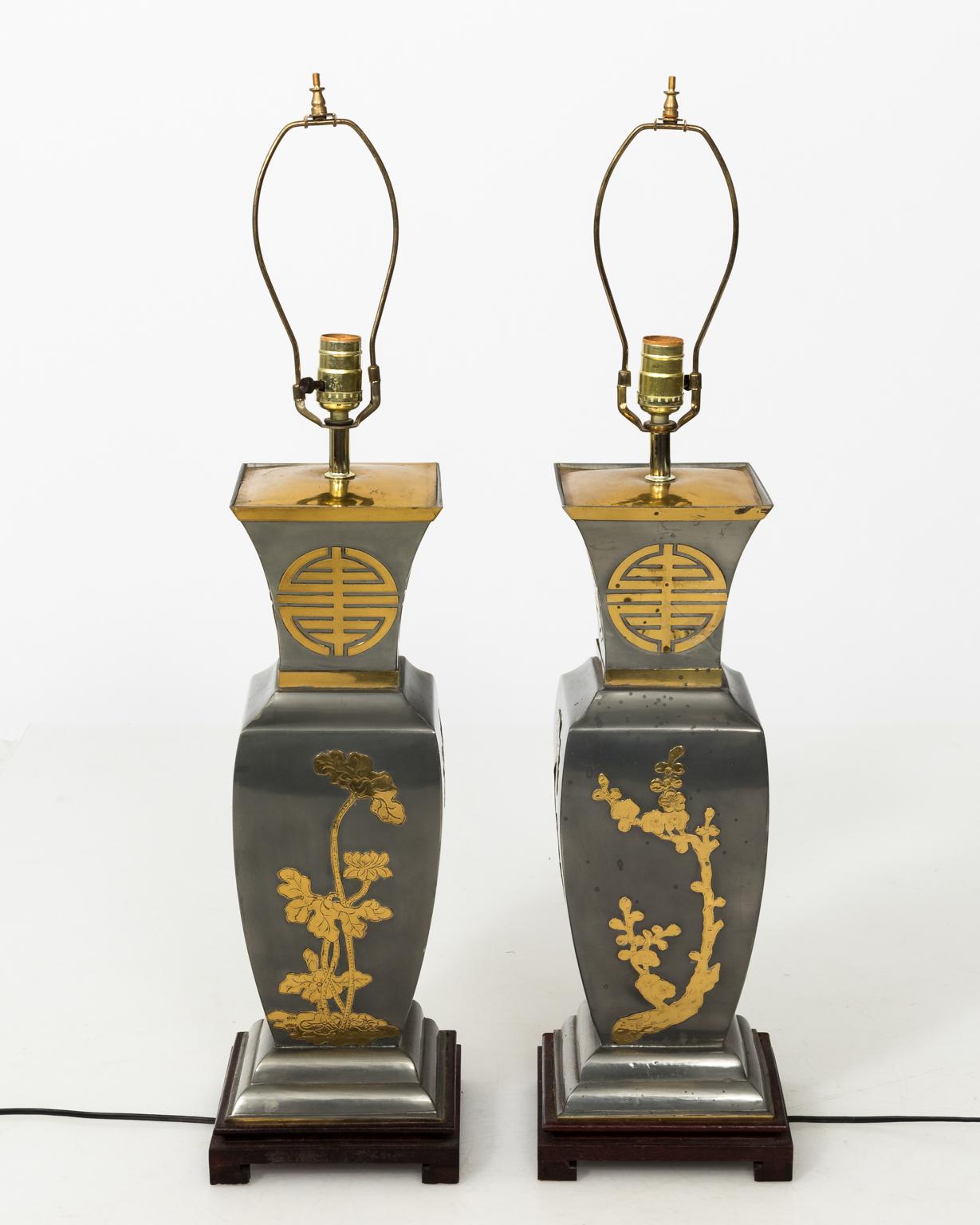 Pair of pewter and brass oriental style lamps without finials, circa mid-20th century. Shades not included.
 