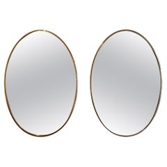 Pair of Brass Oval Mirrors