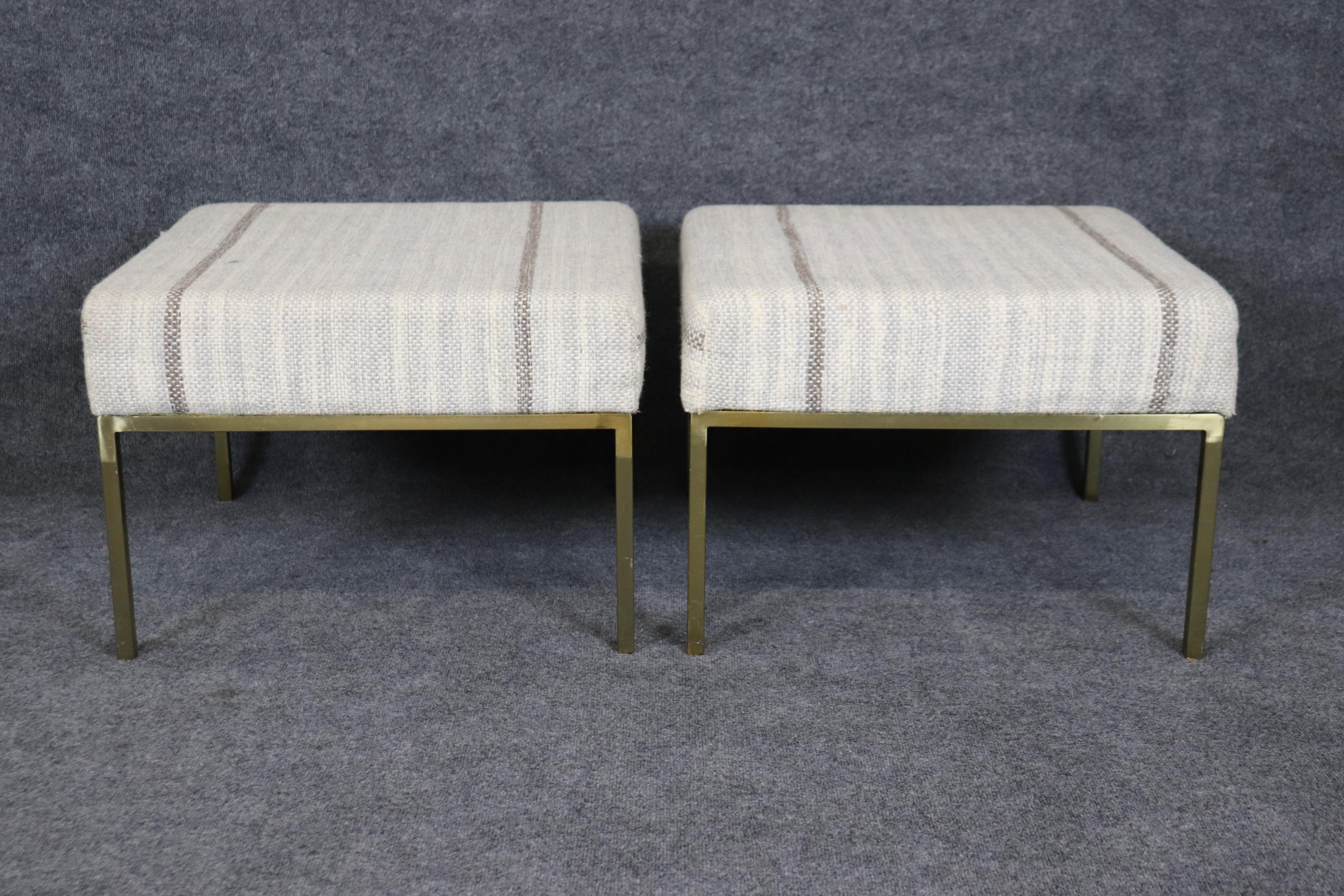 This is a fine pair of brass square mid century modern stools in the style of Paul McCobb for Planner Group. They don't have the x stretcher that most McCobb stools have and more closely resemmble Planner Group by Paul McCobb but I can't find any in