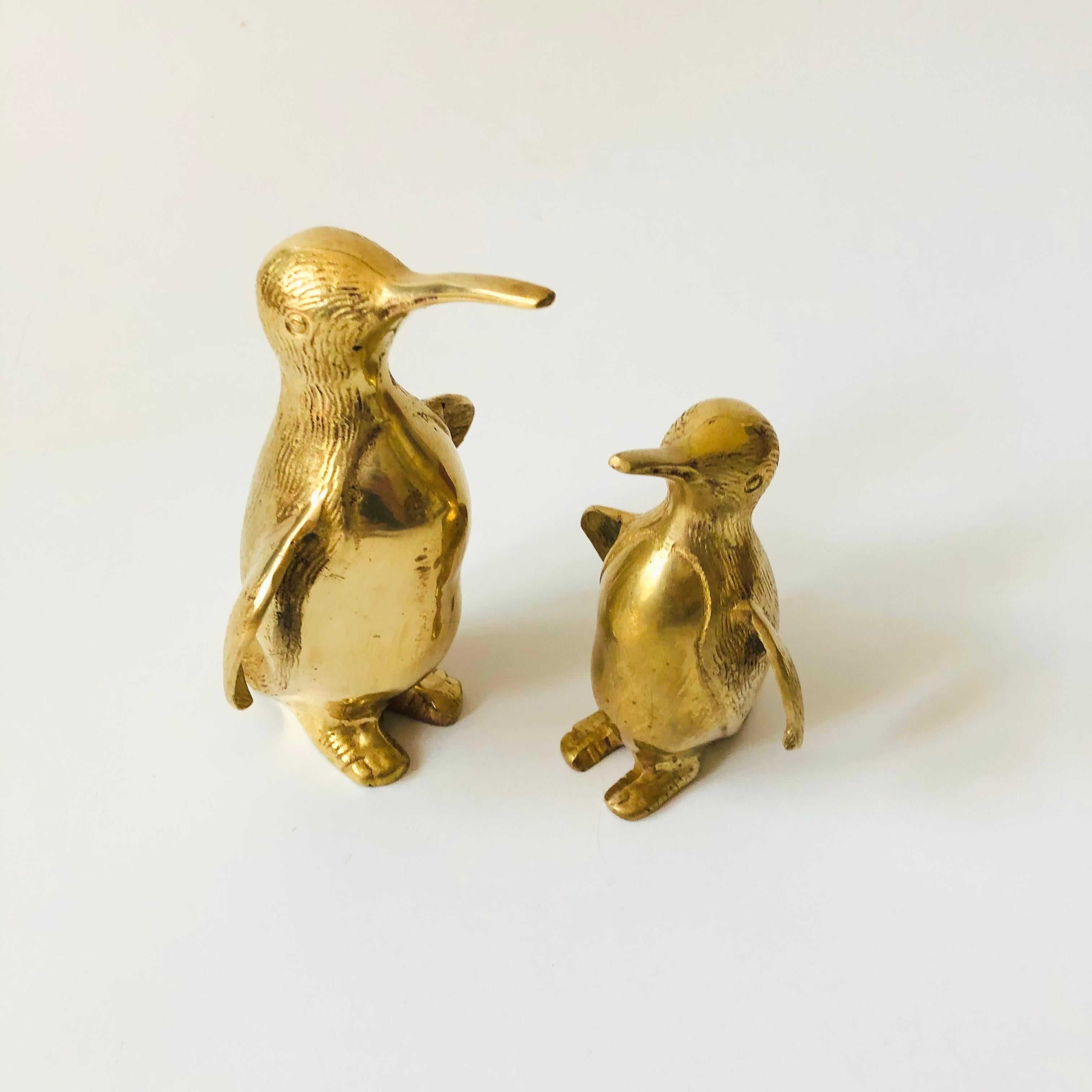 A pair of vintage brass penguins in 2 sizes. High shine to the brass and detailing throughout. Made in Korea.
Measurements:
4