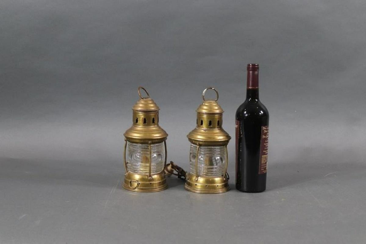 Pair of solid brass Perko boat lanterns. With Fresnel glass lenses.

Overall dimensions: 11