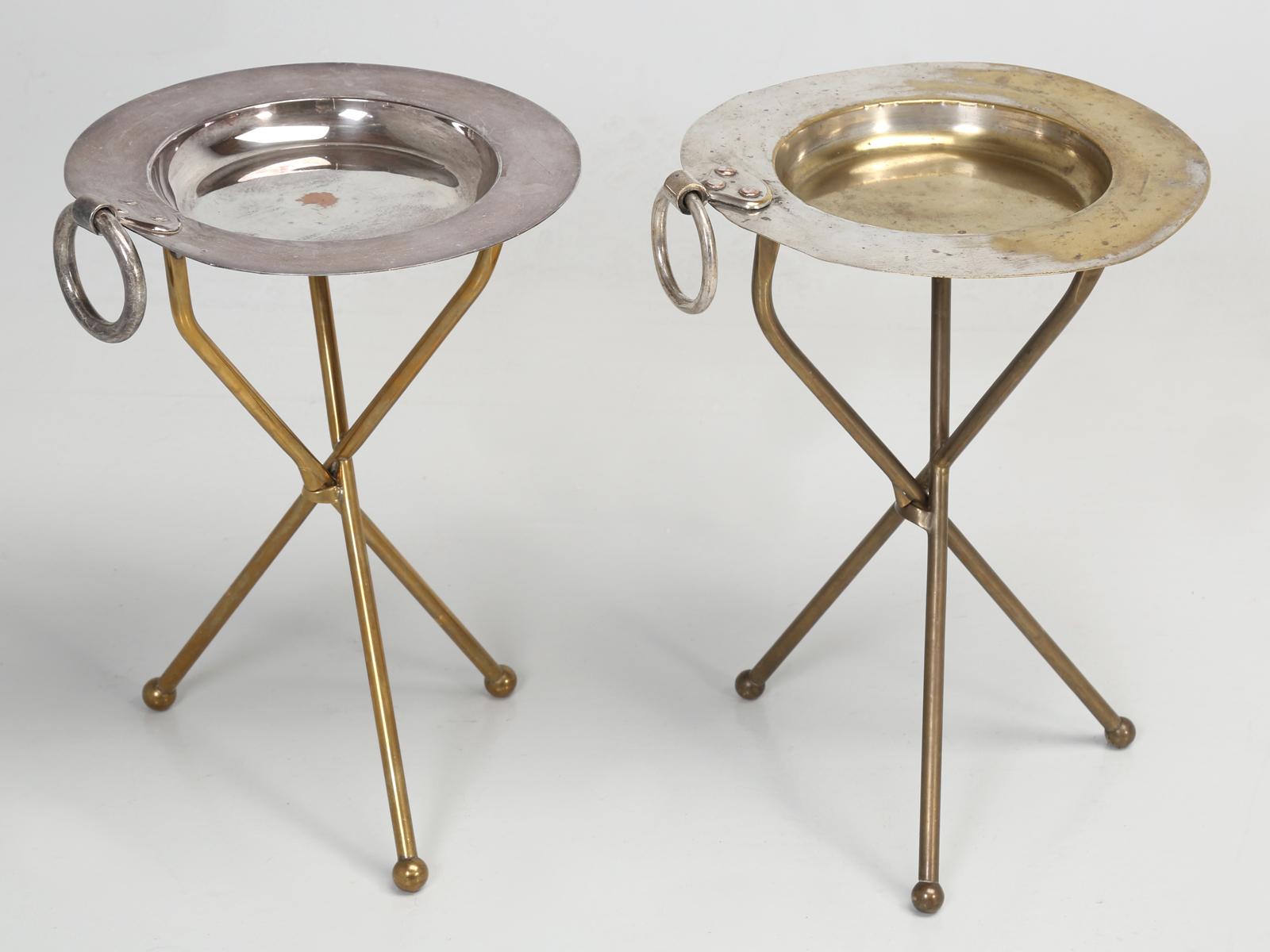 Very unusual pair of attractive French petite Mid-Century Modern side tables, or end table or wine tables and by their appearances, I would guess the latter. Typically, when you see small French metal tables and, in this case, they are made of solid