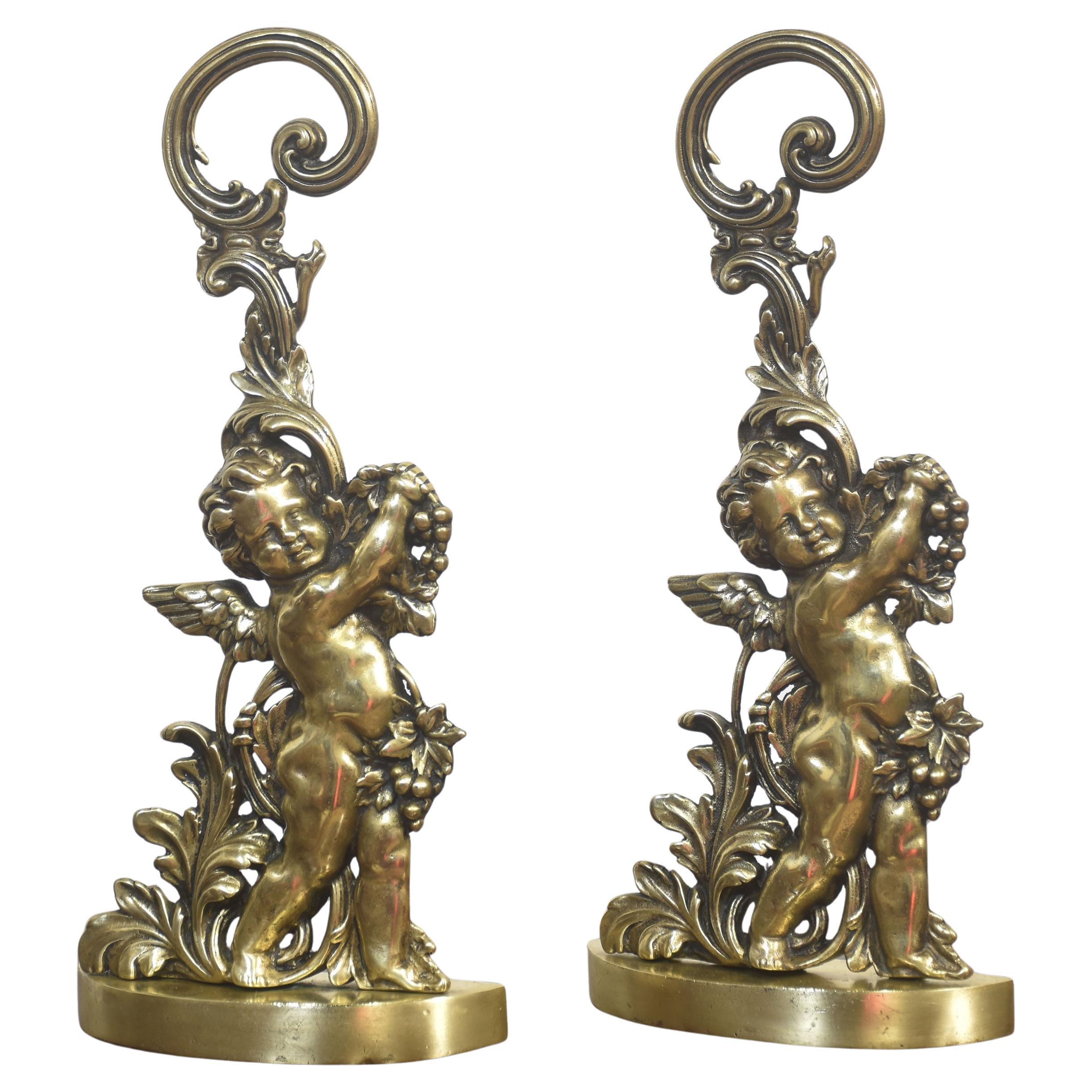 Pair of Brass Putti Door Stops For Sale