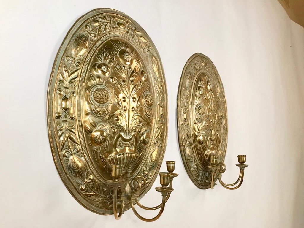 Dutch Pair of Brass Repoussé Three-Light Sconces