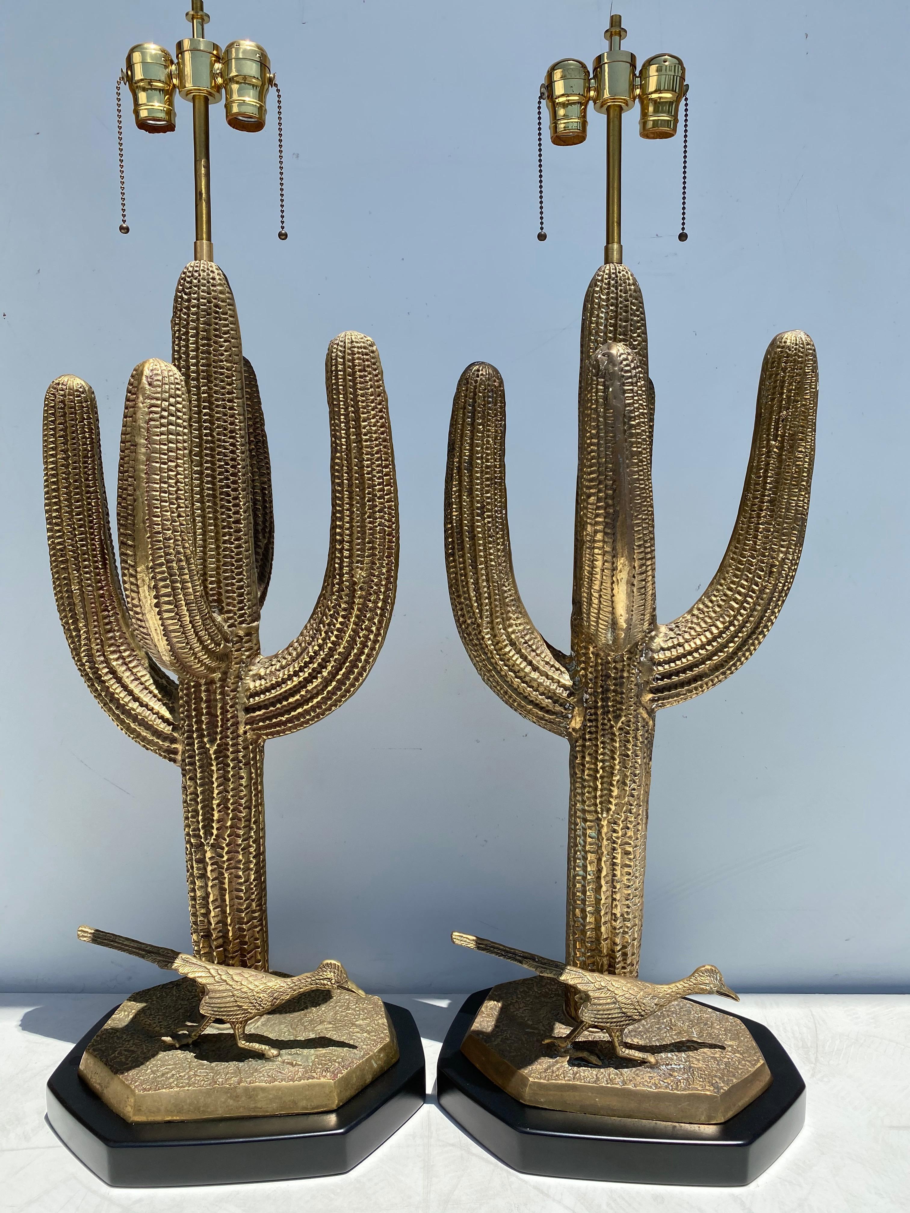 Pair of massive brass Saguaro cactus and roadrunner lamps.