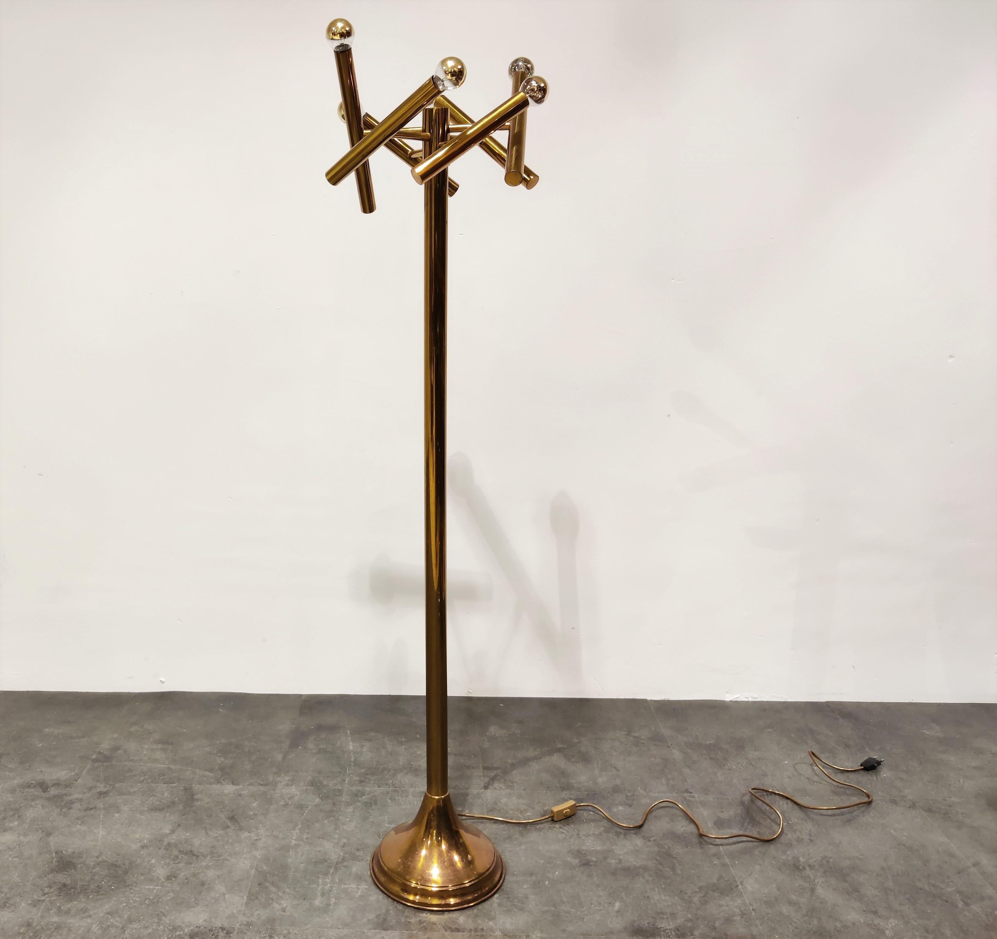 1970s brass 6- lightpoint floor lamp with adjustable arms.

Beautiful timeless design.

Slightly patinated brass.

Tested and ready for use. Works with regular E14 light bulbs.

Good condition.

1970s, Belgium

Dimensions: 

Height