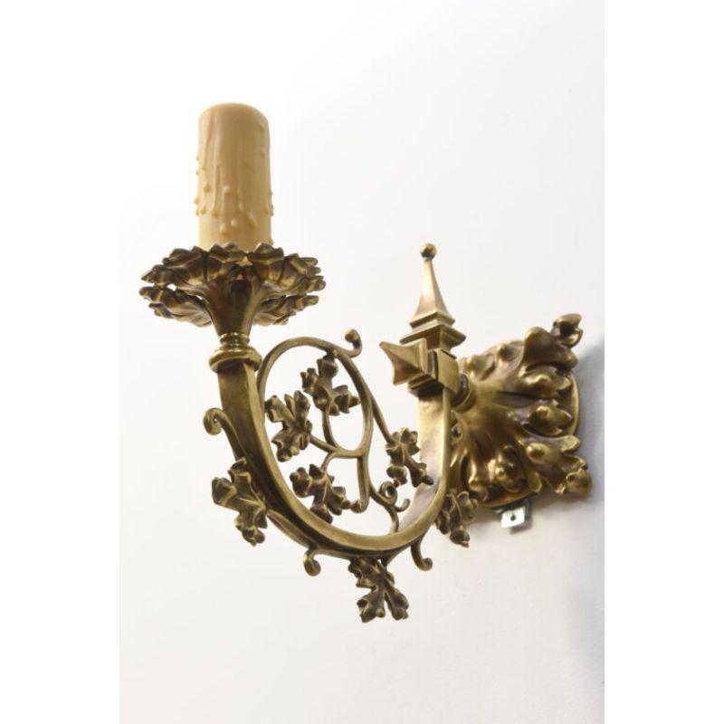 Bronze Pair of Brass Sconces with Cast Leaf Patterned Arms For Sale