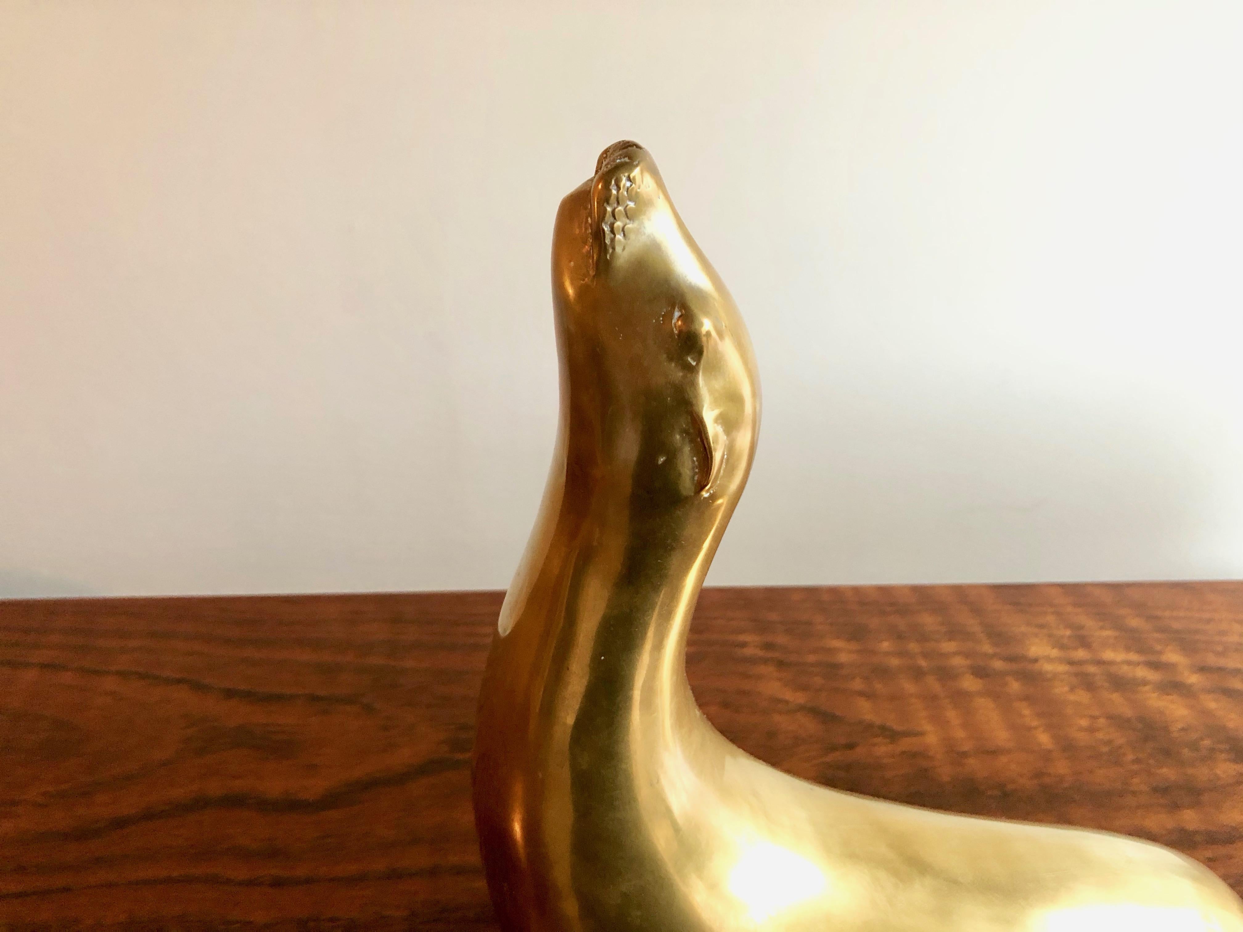 Mid-Century Modern Pair of Brass Seal Sculptures  For Sale