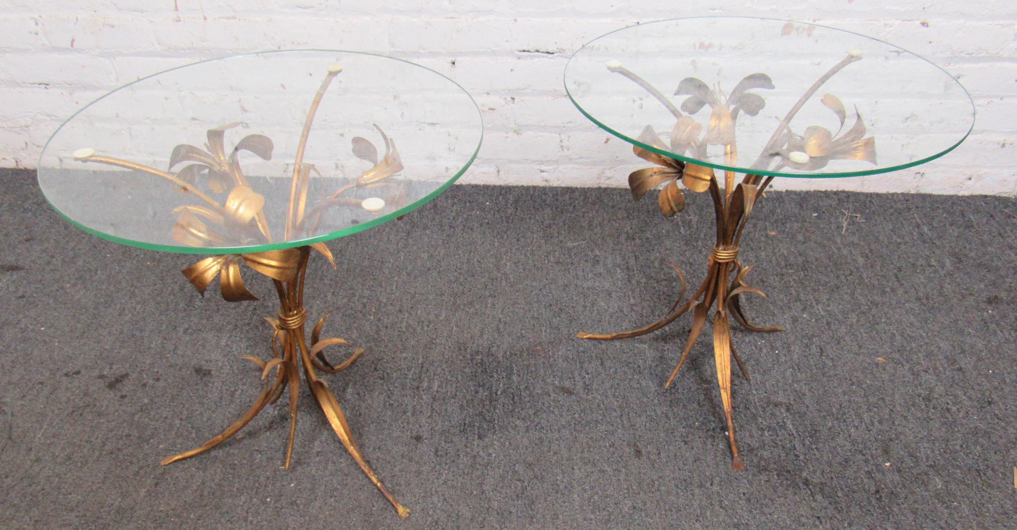 Elegant pair of glass and brass side tables. Italian made with floral bases.
(Please confirm item location - NY or NJ - with dealer).
 