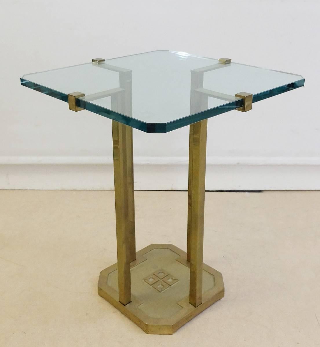 Pair of two side tables in brass with tray in glass. Designed by Peter Ghyczy.