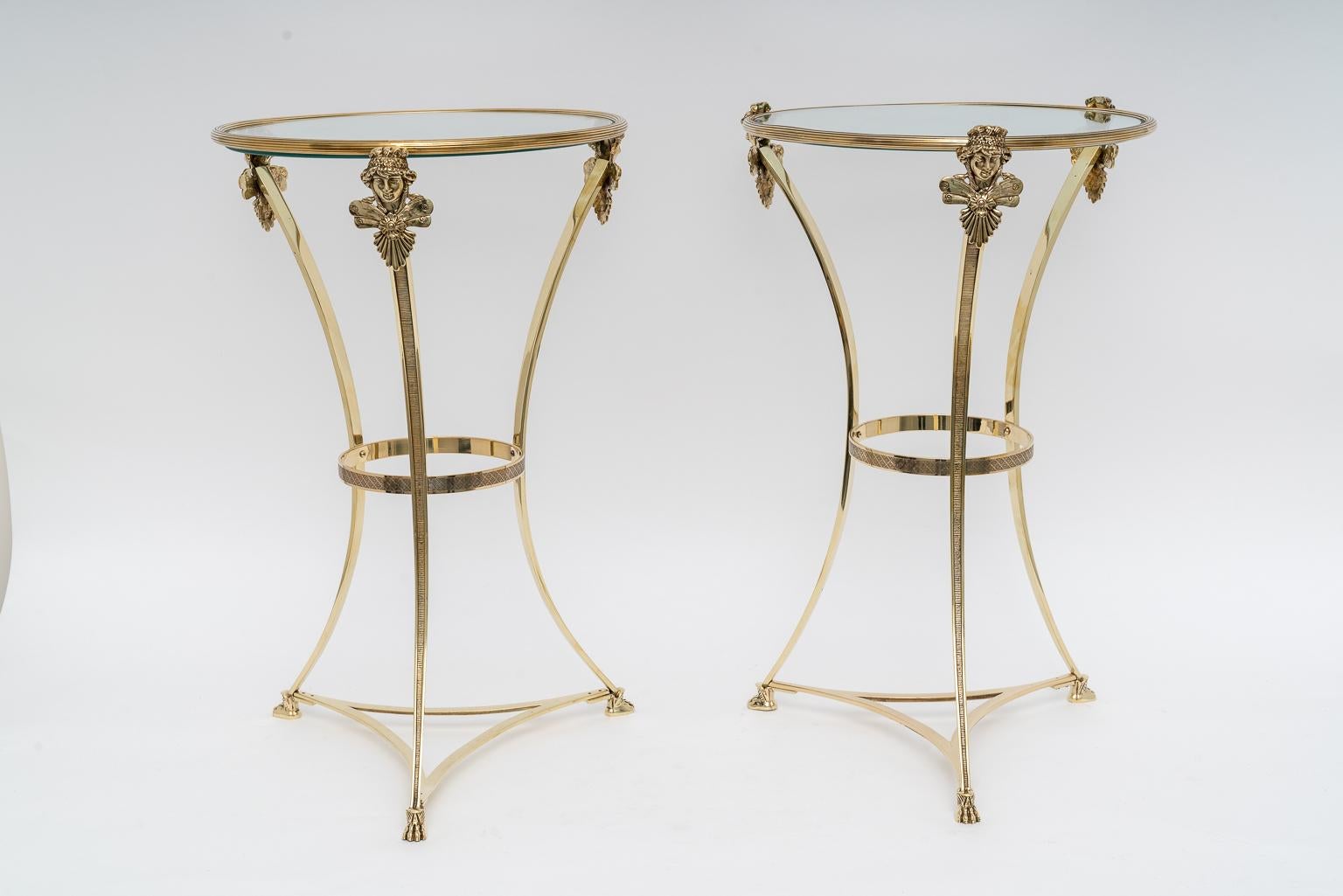 This stylish set of Maison Jansen, French Regence style brass side tables were acquired from a Palm Beach estate and date to the 1930s-1940s. 

Note: They have been professionally polished.