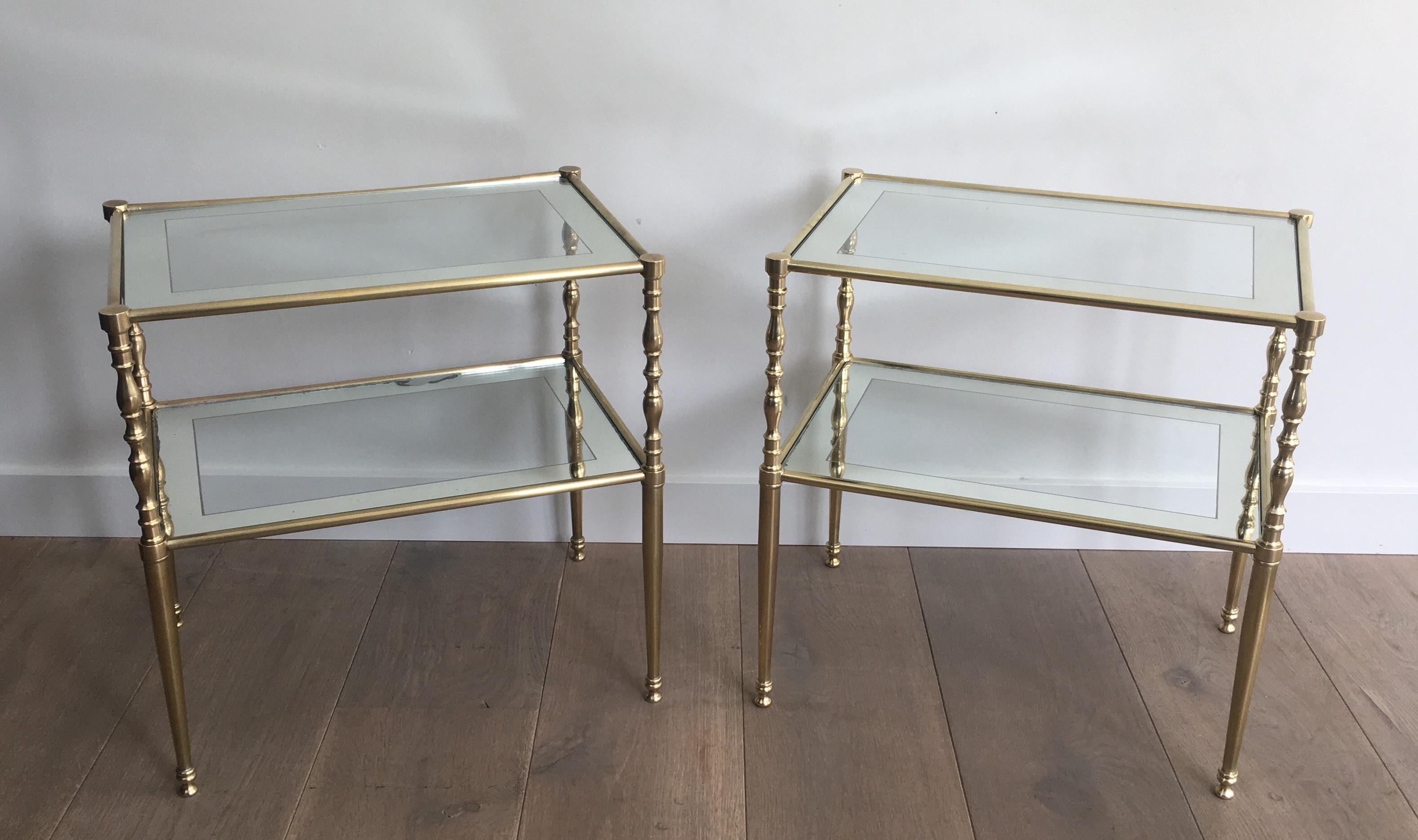 French Pair of Brass Side Tables with Clear Glass Shelves Surrounded by Silvered Mirror