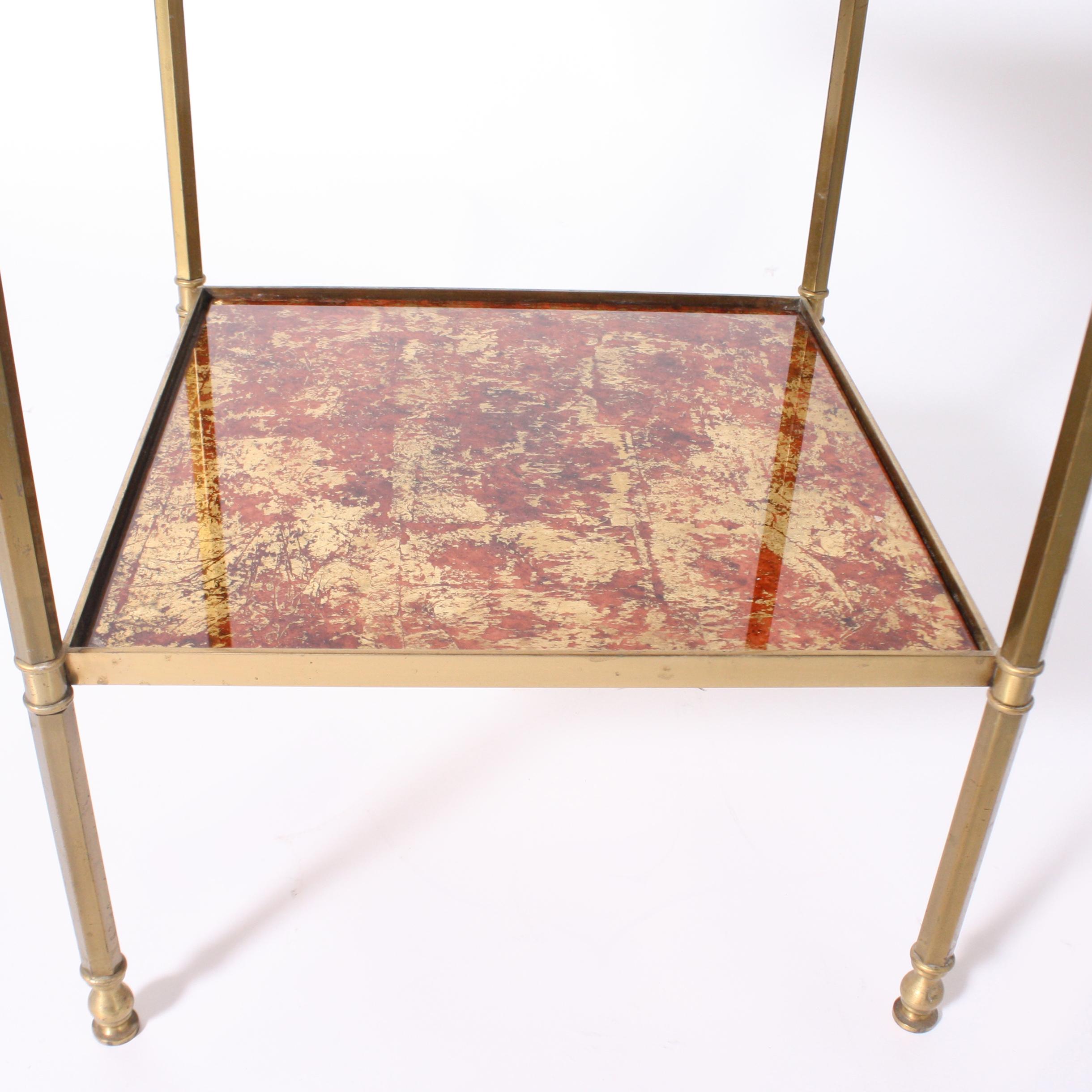Italian Pair of Brass Side Tables with Reverse Painted Glass Shelves, circa 1950