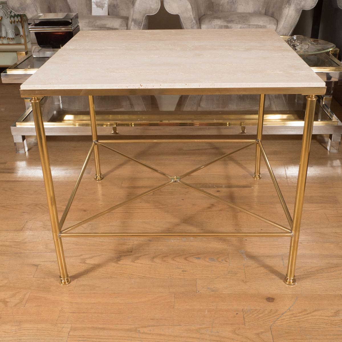 Pair of large brass side tables with X form bases and travertine tops.

Dimensions: 25.75
