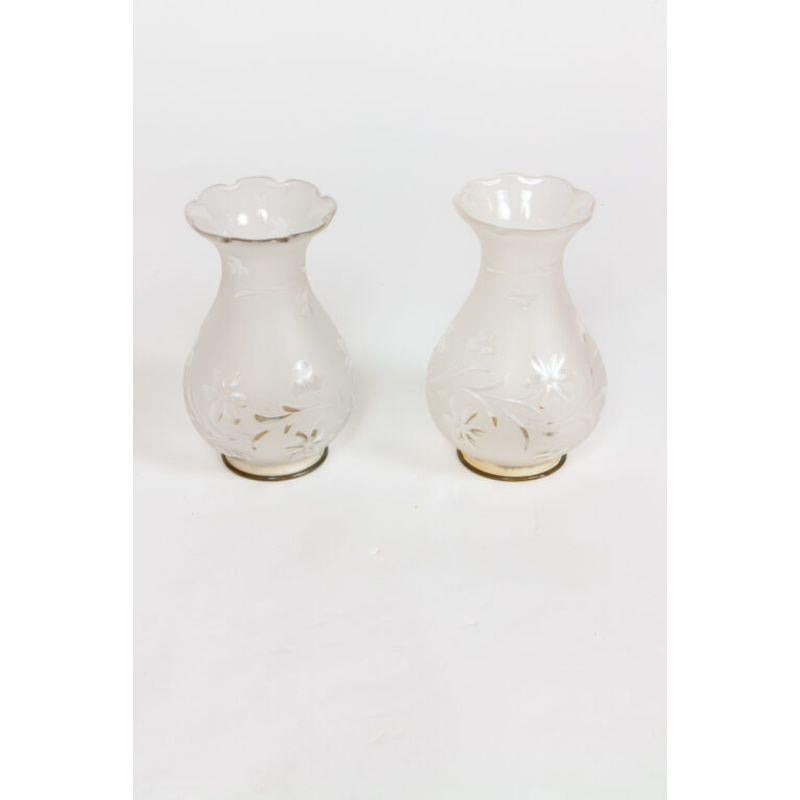 Brass sconces, originally with gas burners. Elegant glass shades with a scalloped rim and cut with a floral pattern. Brass has been handpolished and lacquered to protect the finish. 

Material: Brass, Glass
Style: American Classical,