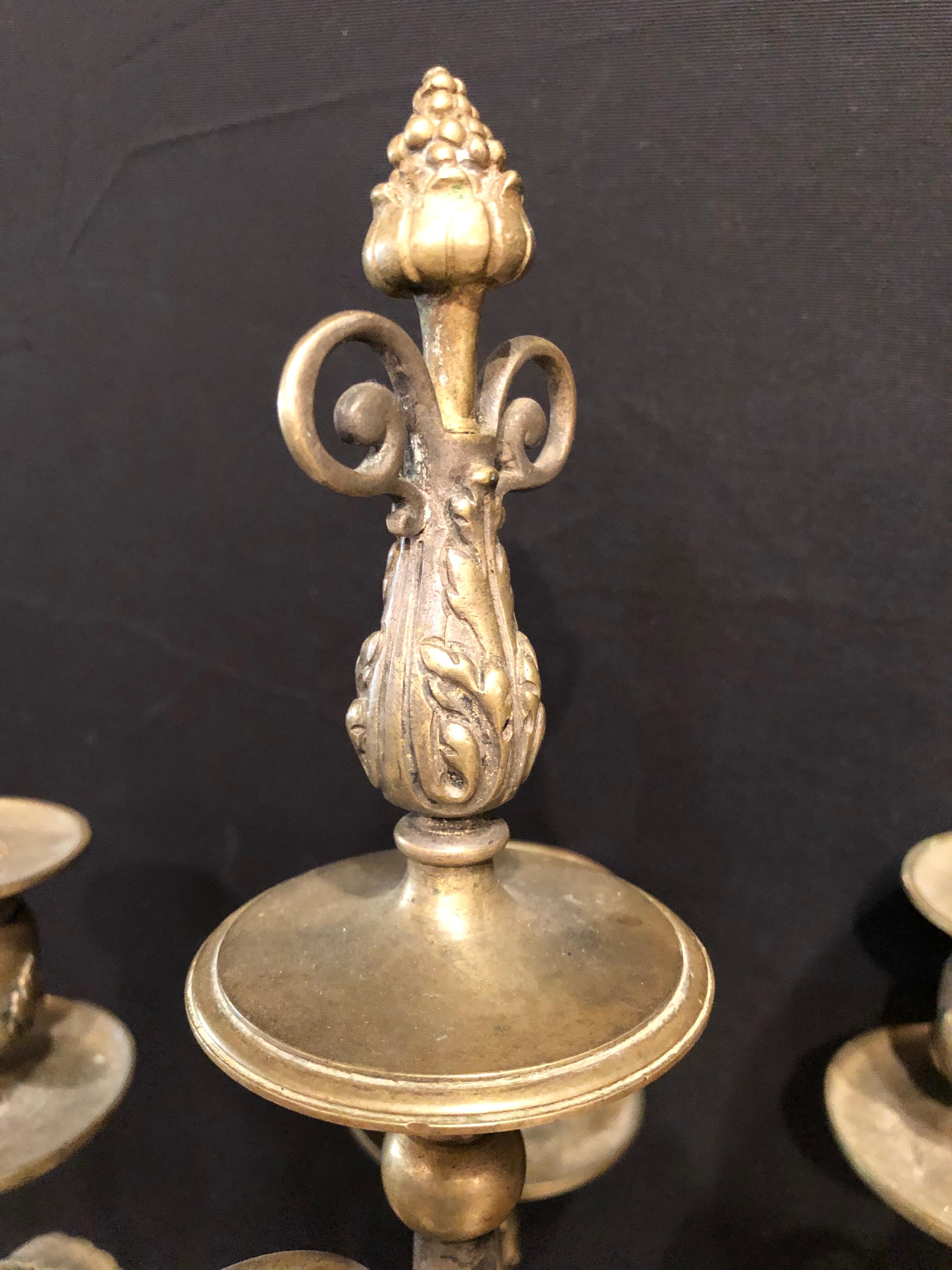 Pair of Brass Six-Arm Candelabras Bearing Figurative Faces and Fruits 6