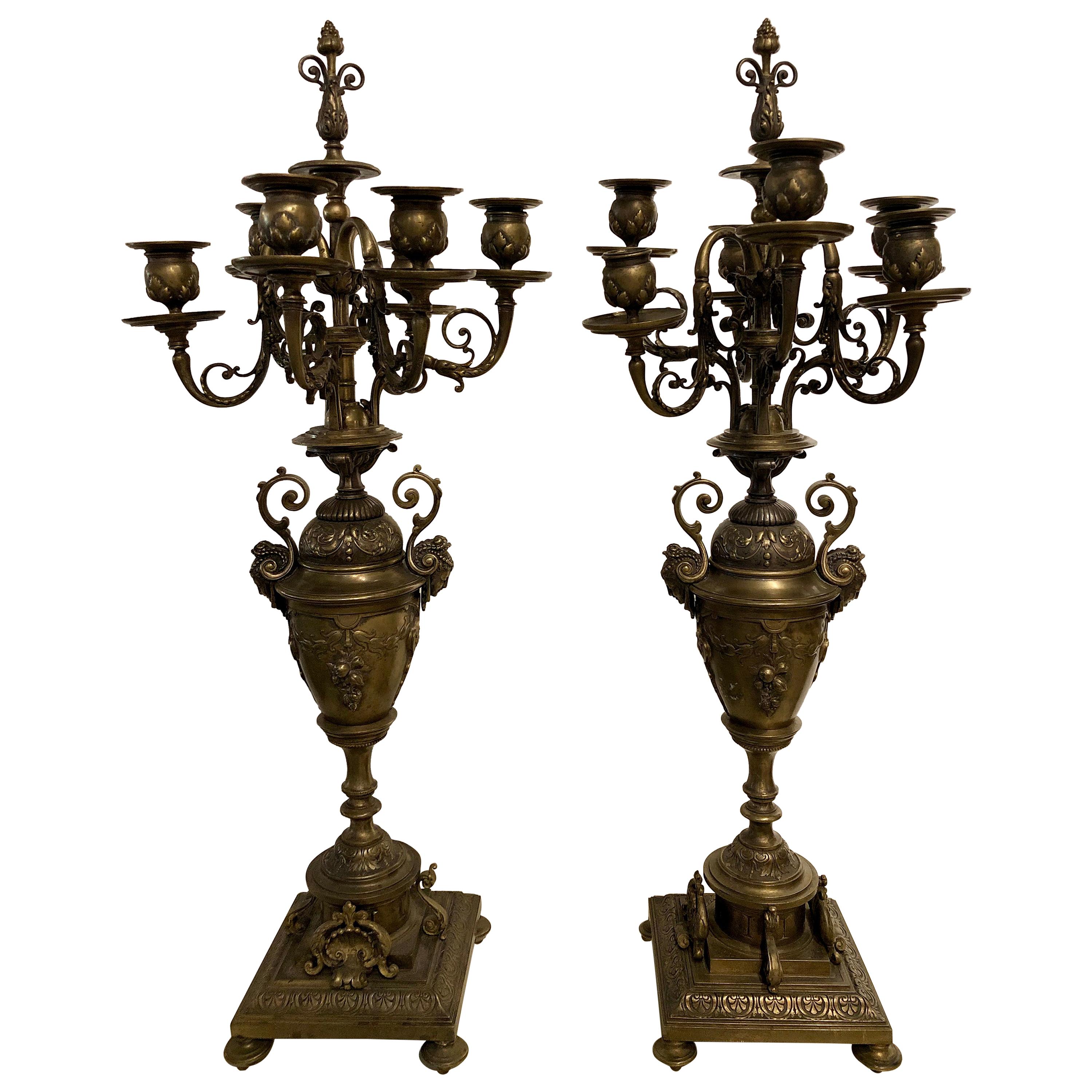 Pair of Brass Six-Arm Candelabras Bearing Figurative Faces and Fruits
