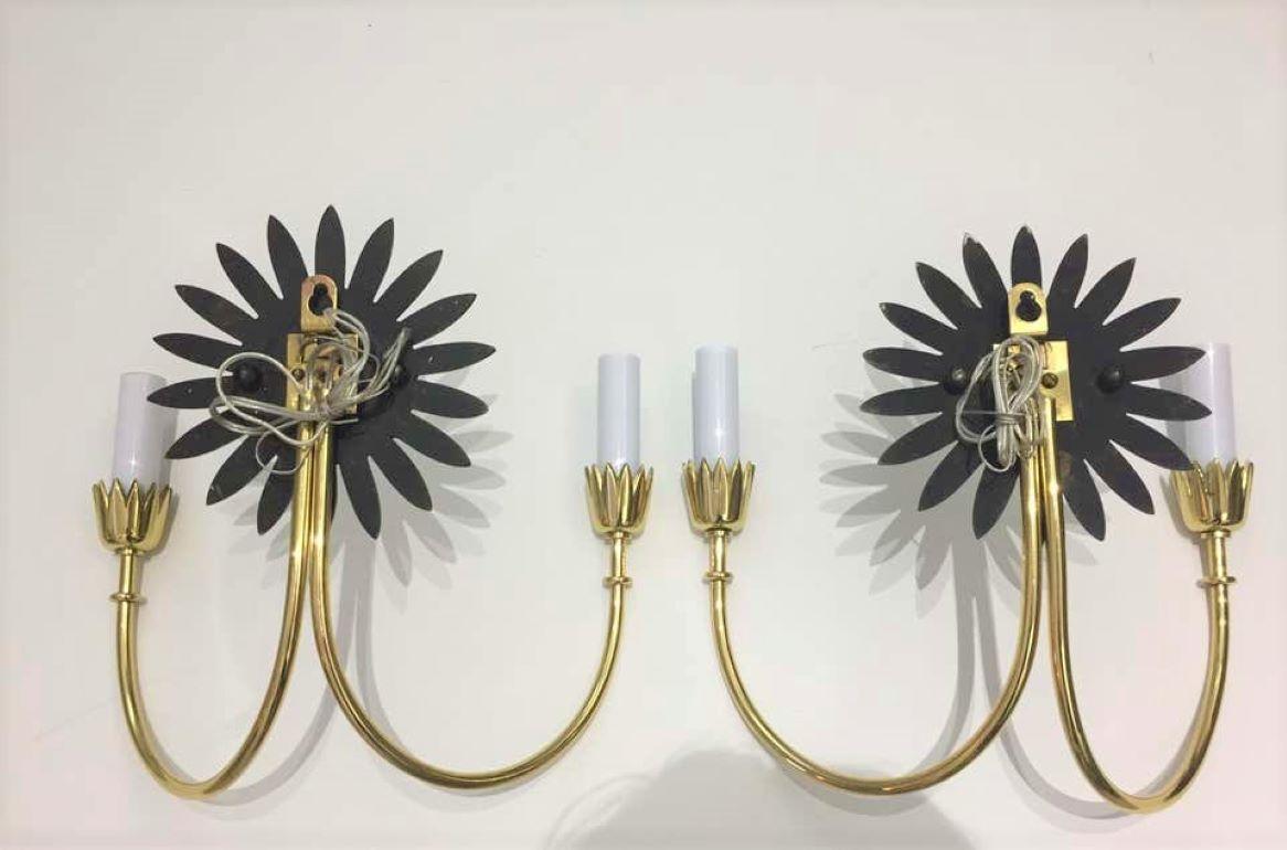 Mid-Century Modern Pair of Brass Sunflower Motif Brass Wall Sconces For Sale